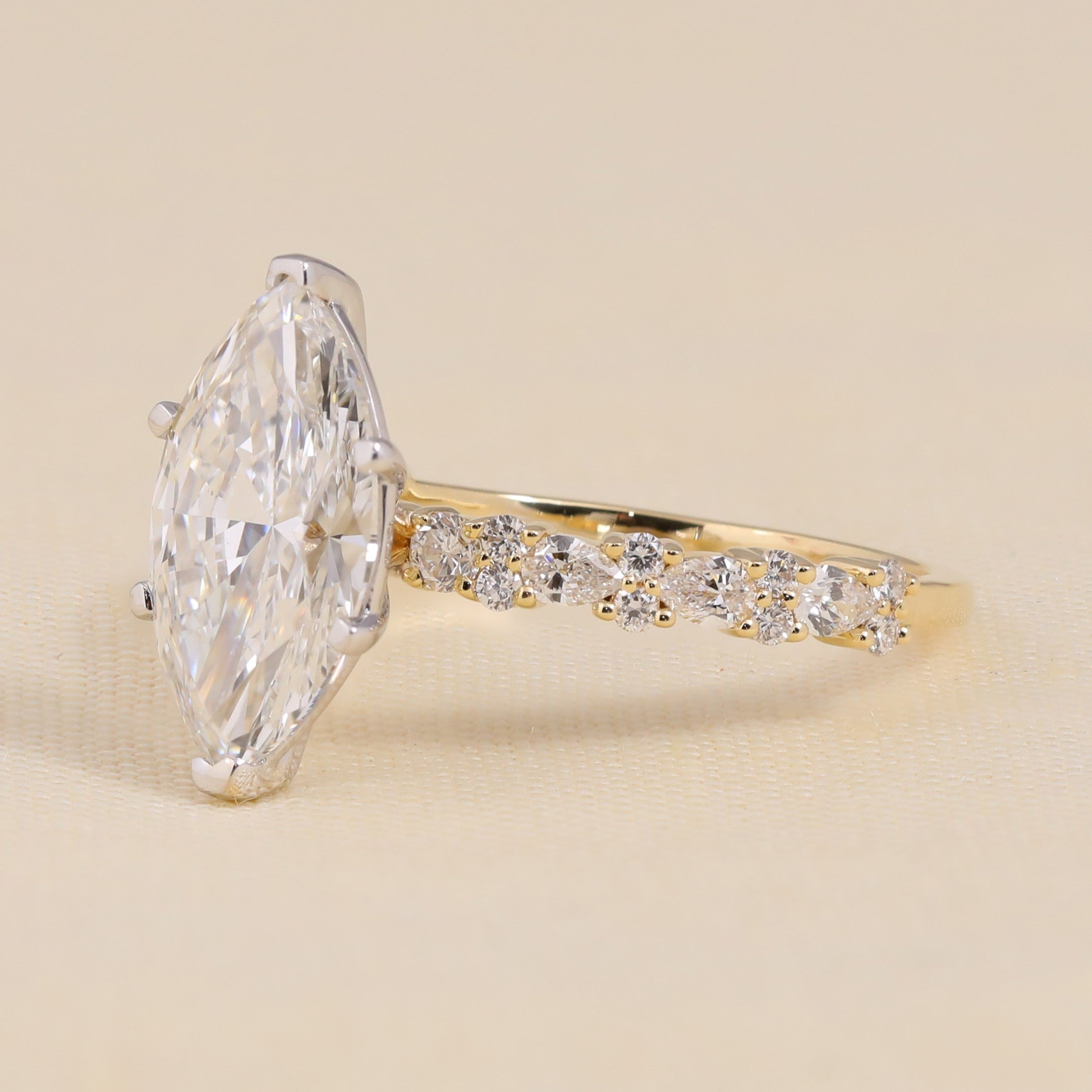Brilliant marquise lab-grown diamond engagement ring with accent diamonds