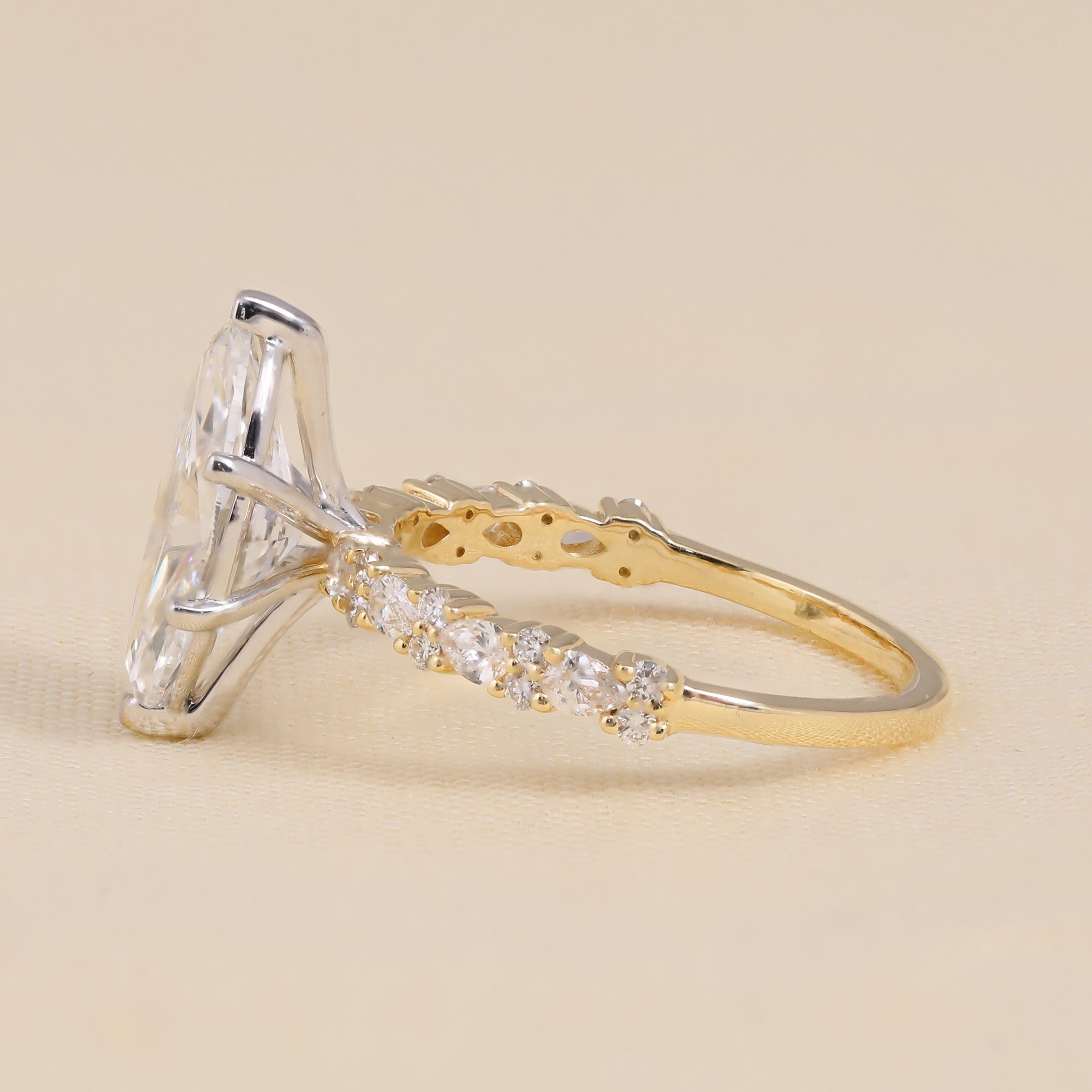 Marquise-shaped lab-grown diamond engagement ring with a bright, tapered band