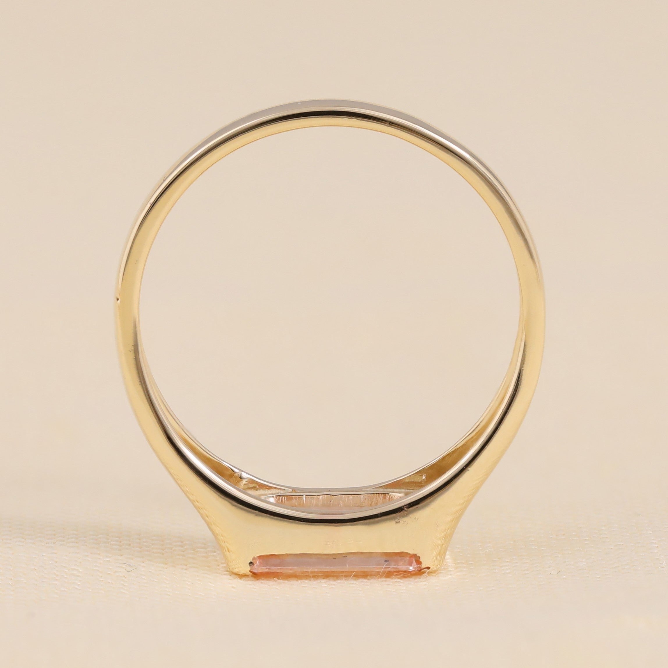 Eco-friendly pink lab grown emerald cut diamond ring in classic gold