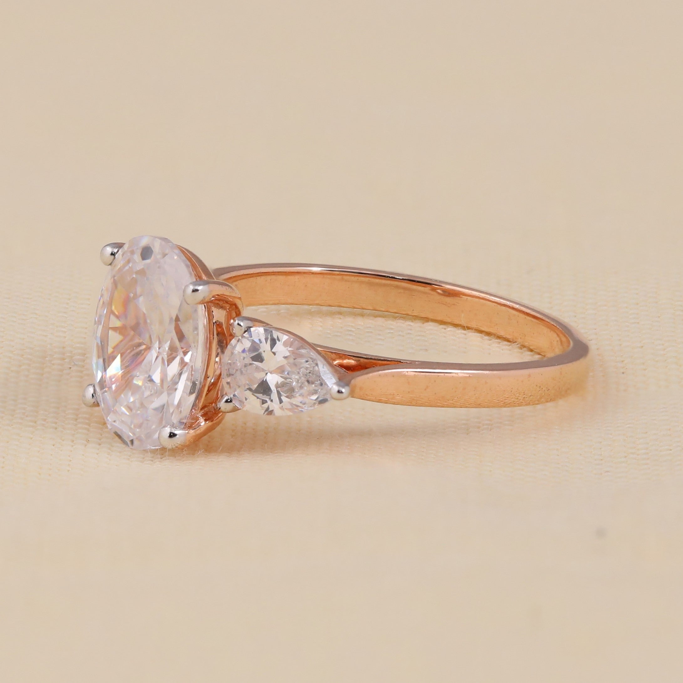 Three stone oval Lab Grown Diamond ring with pear accent diamonds for women