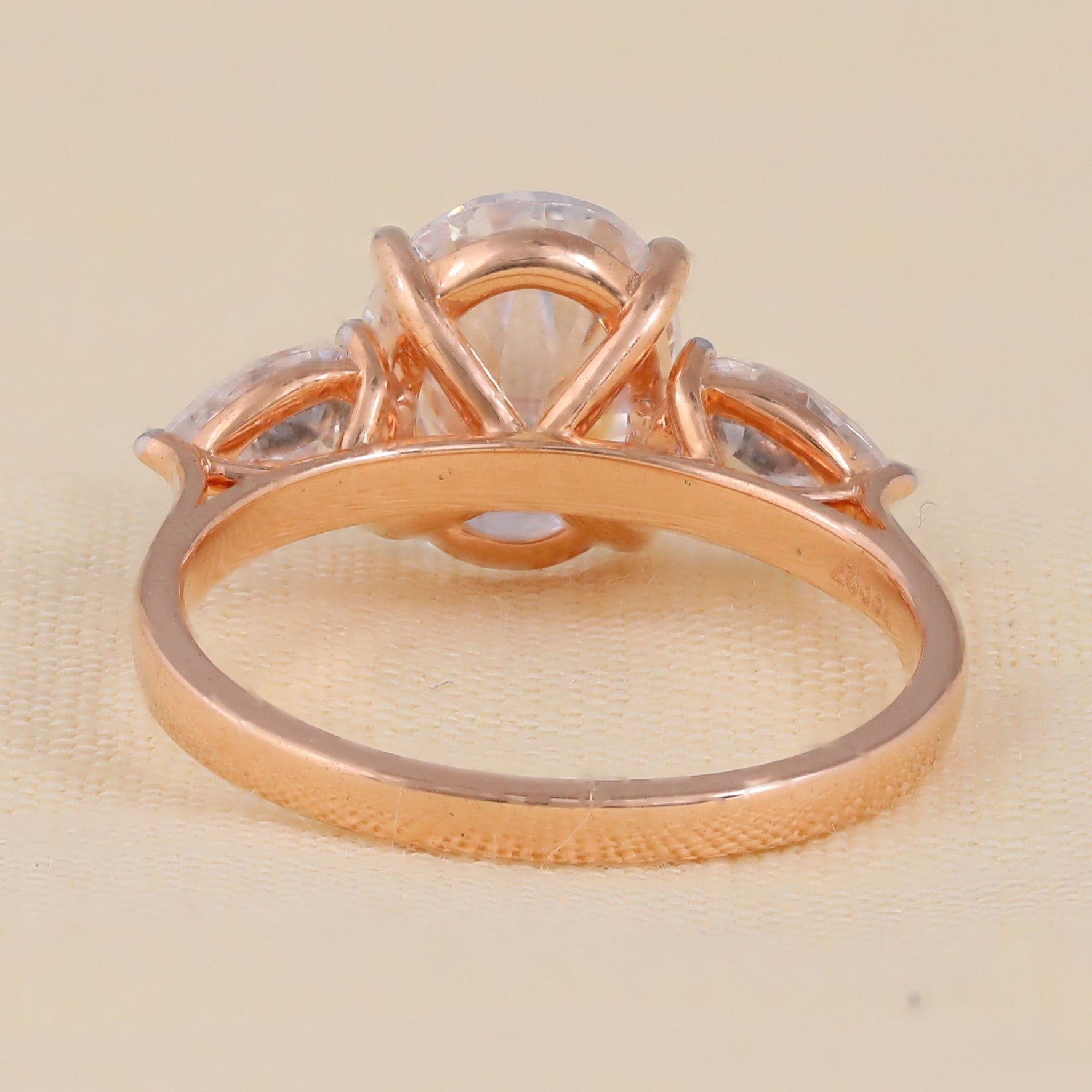 Unique oval engagement ring with pear shaped lab grown diamonds