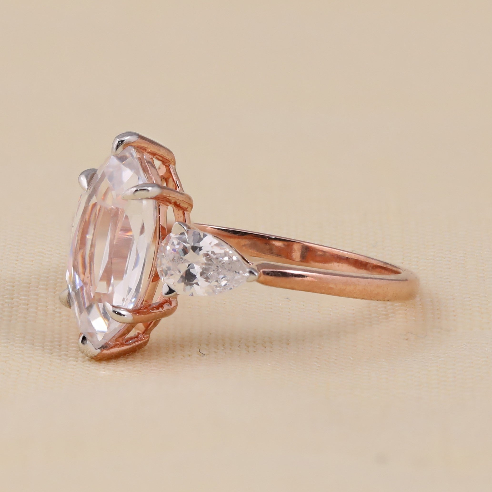 Three stone marquise and pear cut diamond style ring for wedding engagement