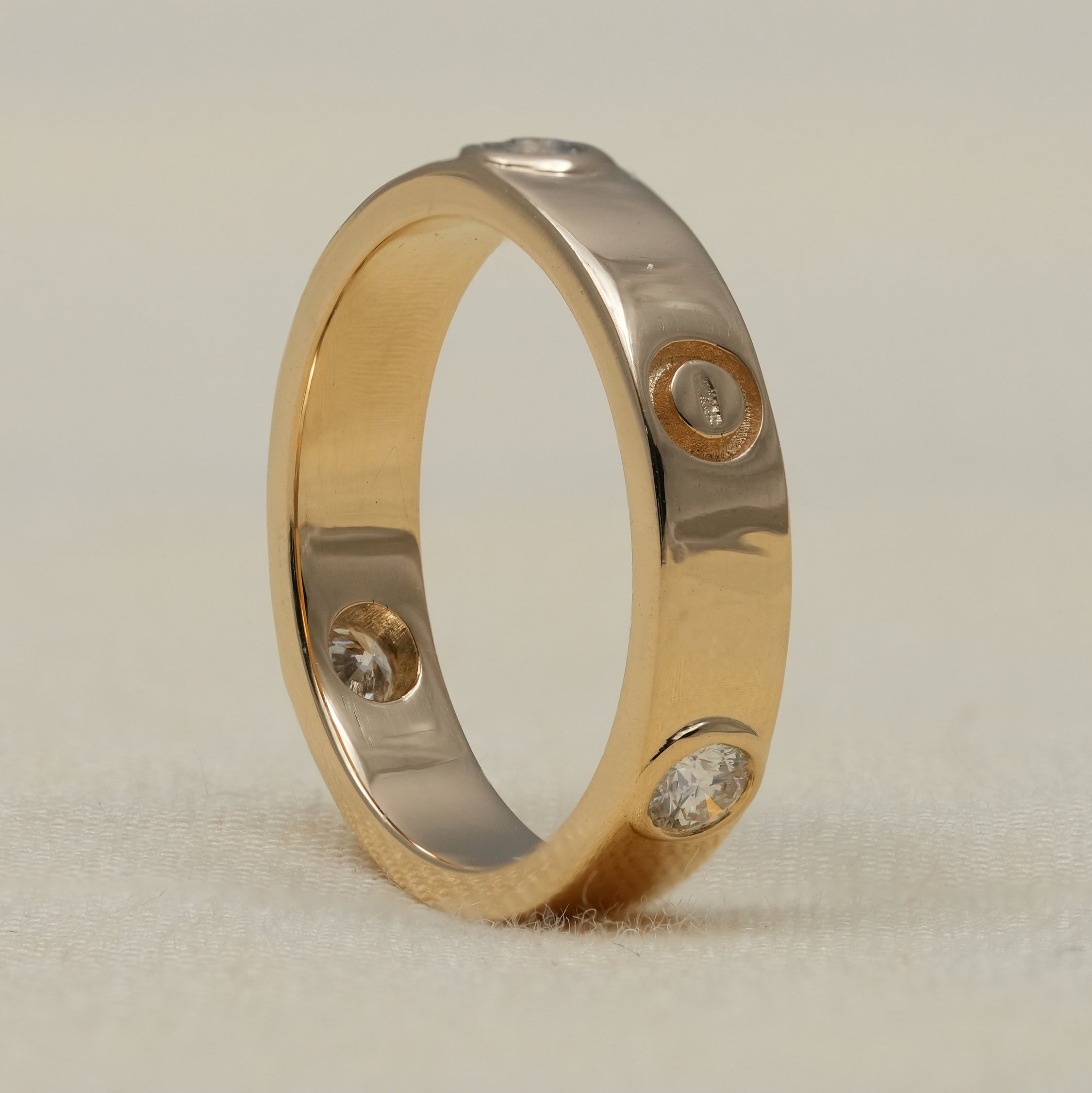 Contemporary lab grown diamond band ring with smooth gold finish