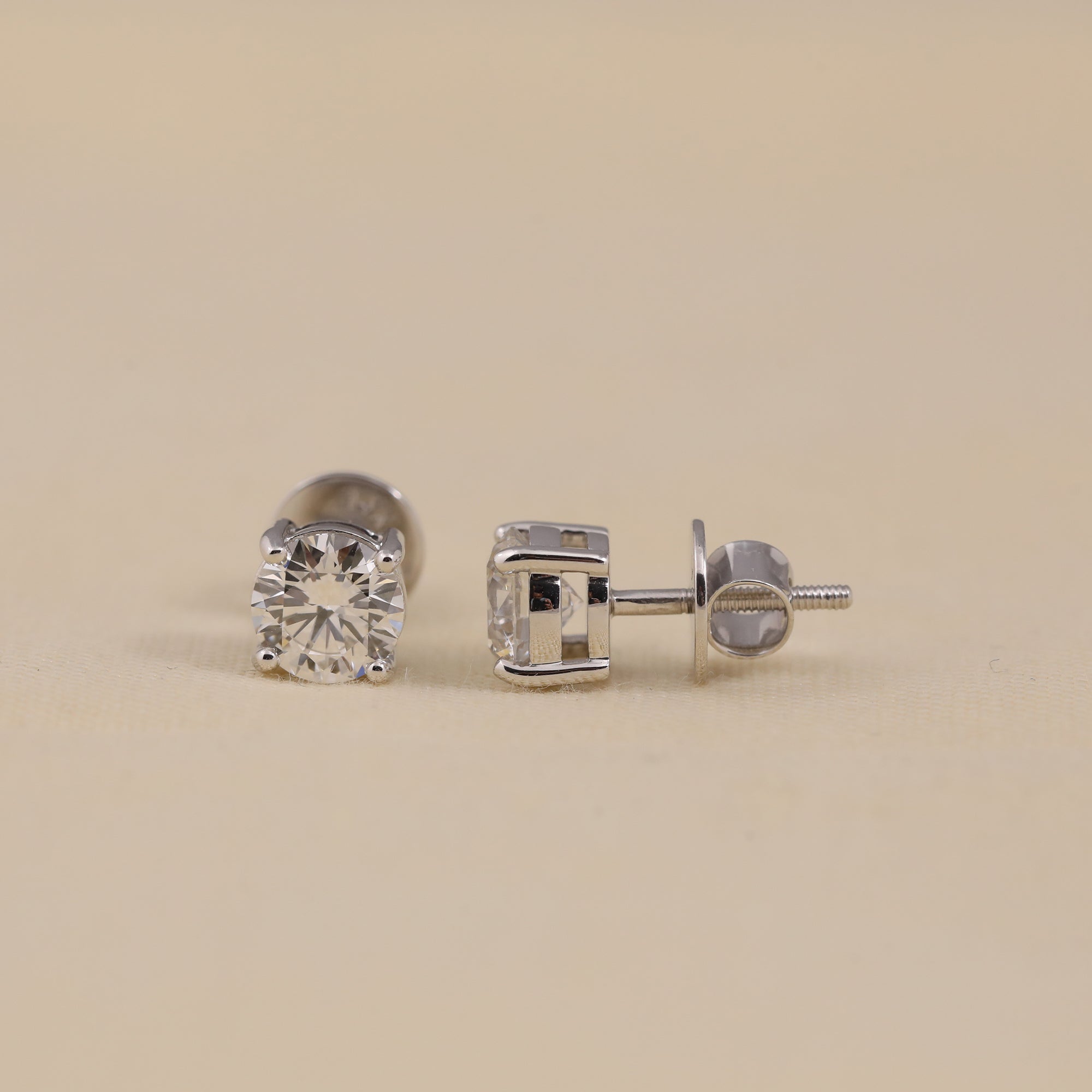 Classic round-cut diamond studs great for office wear and events