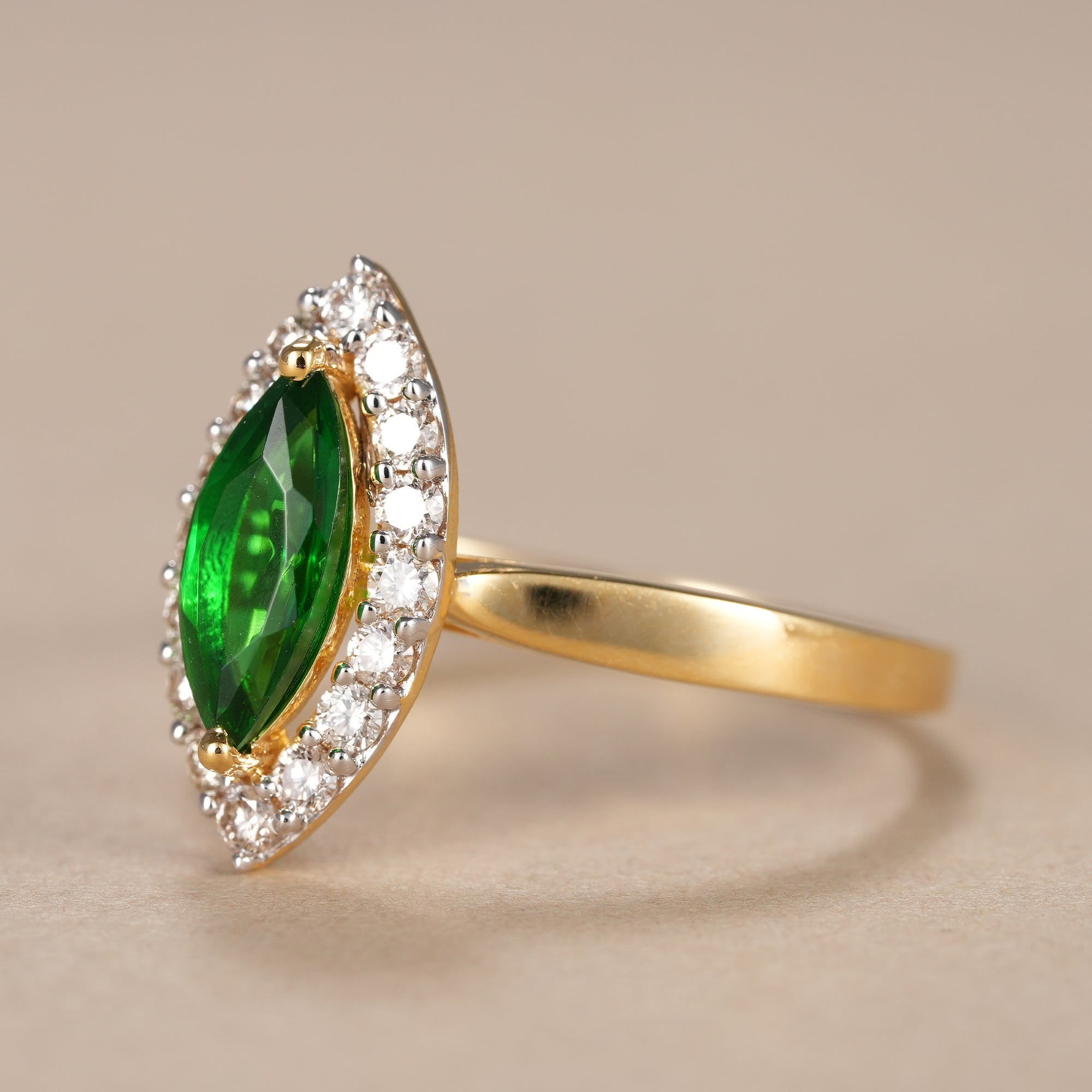 Marquise Cut Emerald Diamond Halo Engagement Ring
