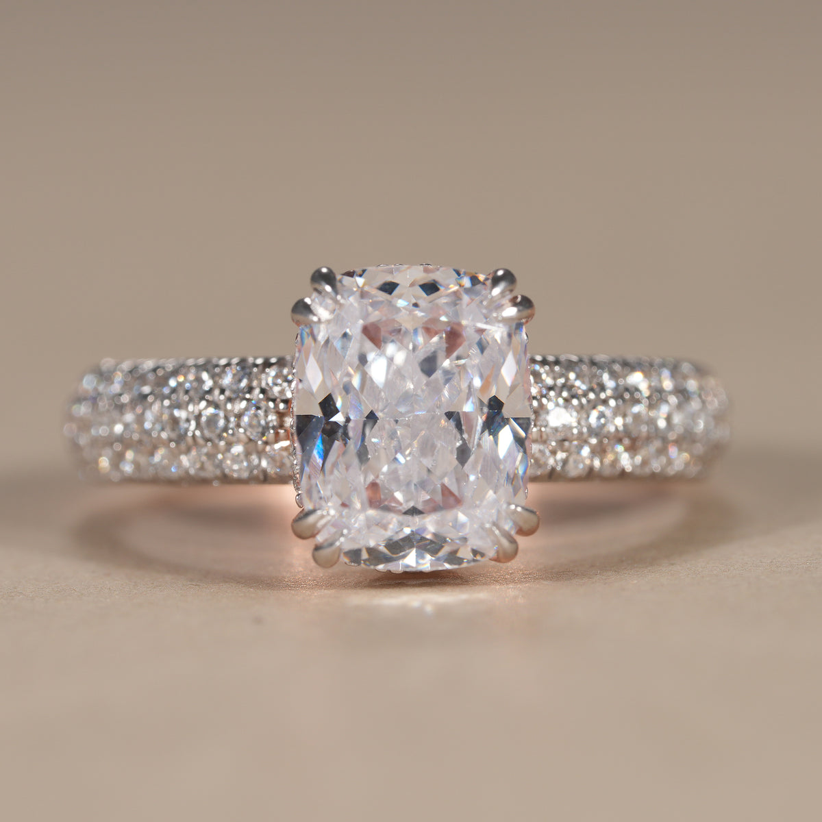 Cushion lab grown diamond engagement ring featuring a brilliant 2 CT center stone with pavé band.
