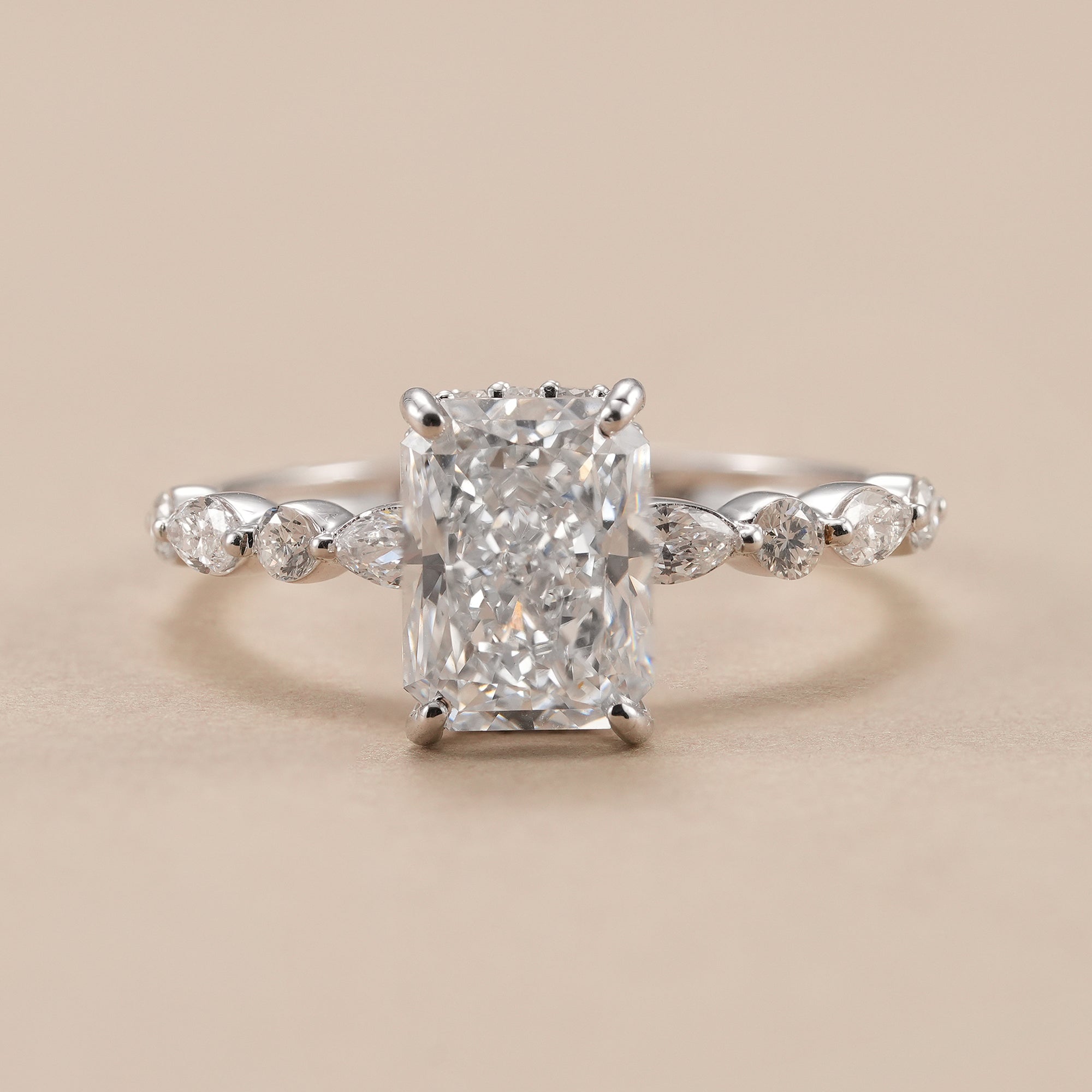 2 CT radiant lab grown diamond hidden halo engagement ring in white gold.