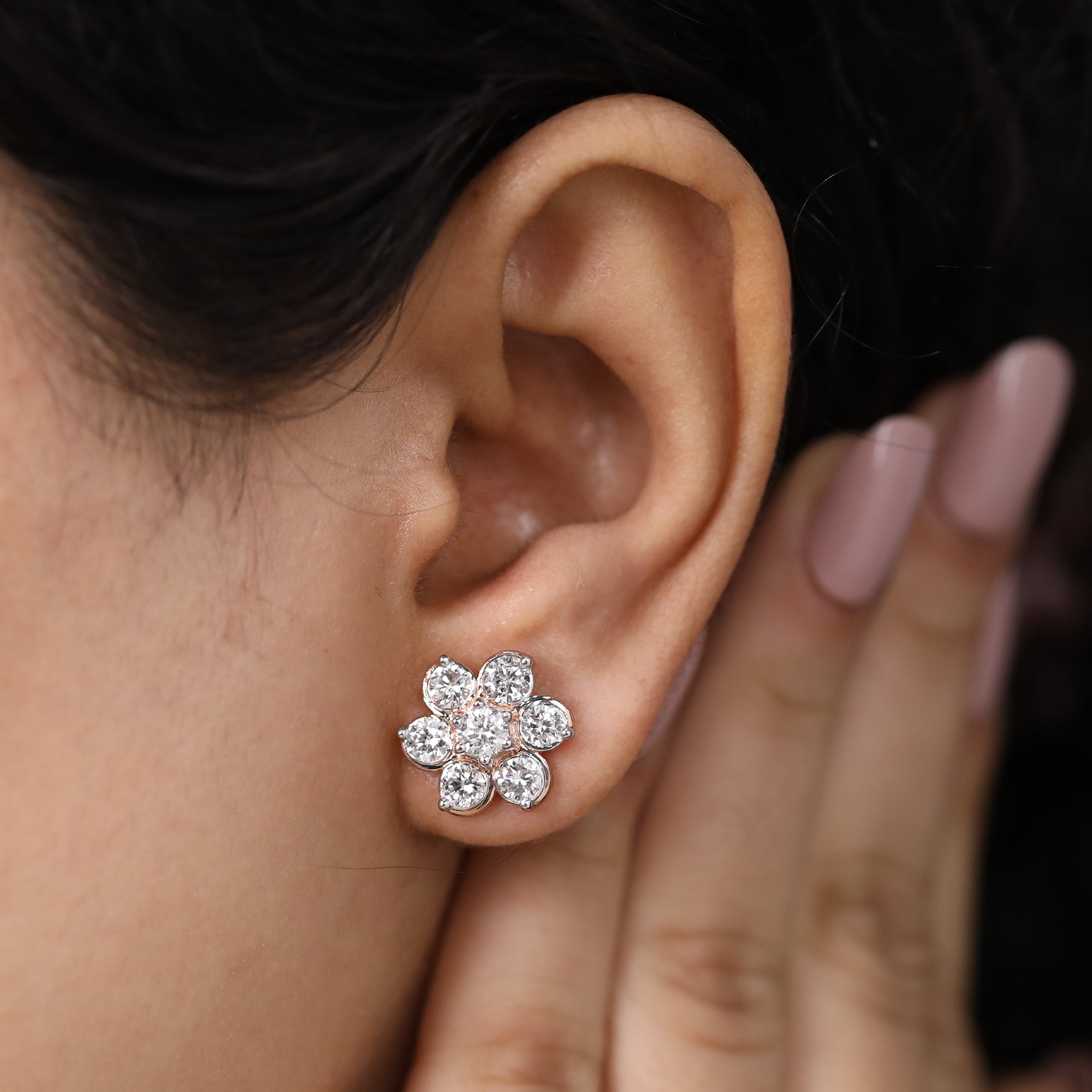 Flower shaped diamond studs designed for birthday and elegant celebration looks