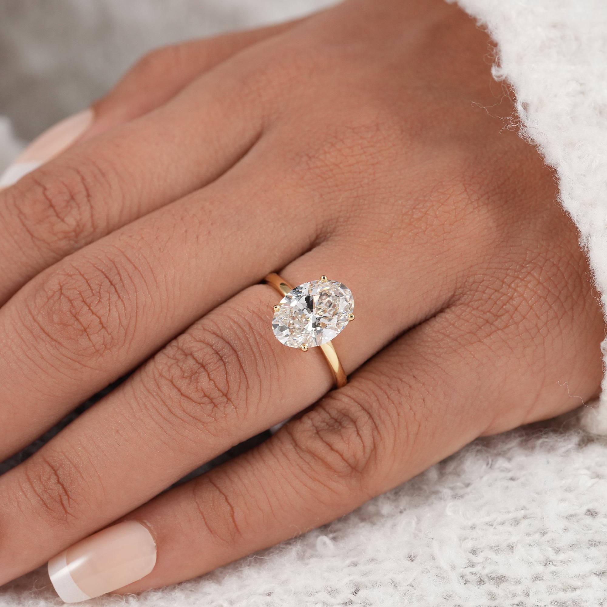 Elegant oval lab diamond solitaire ring for bridal jewelry.