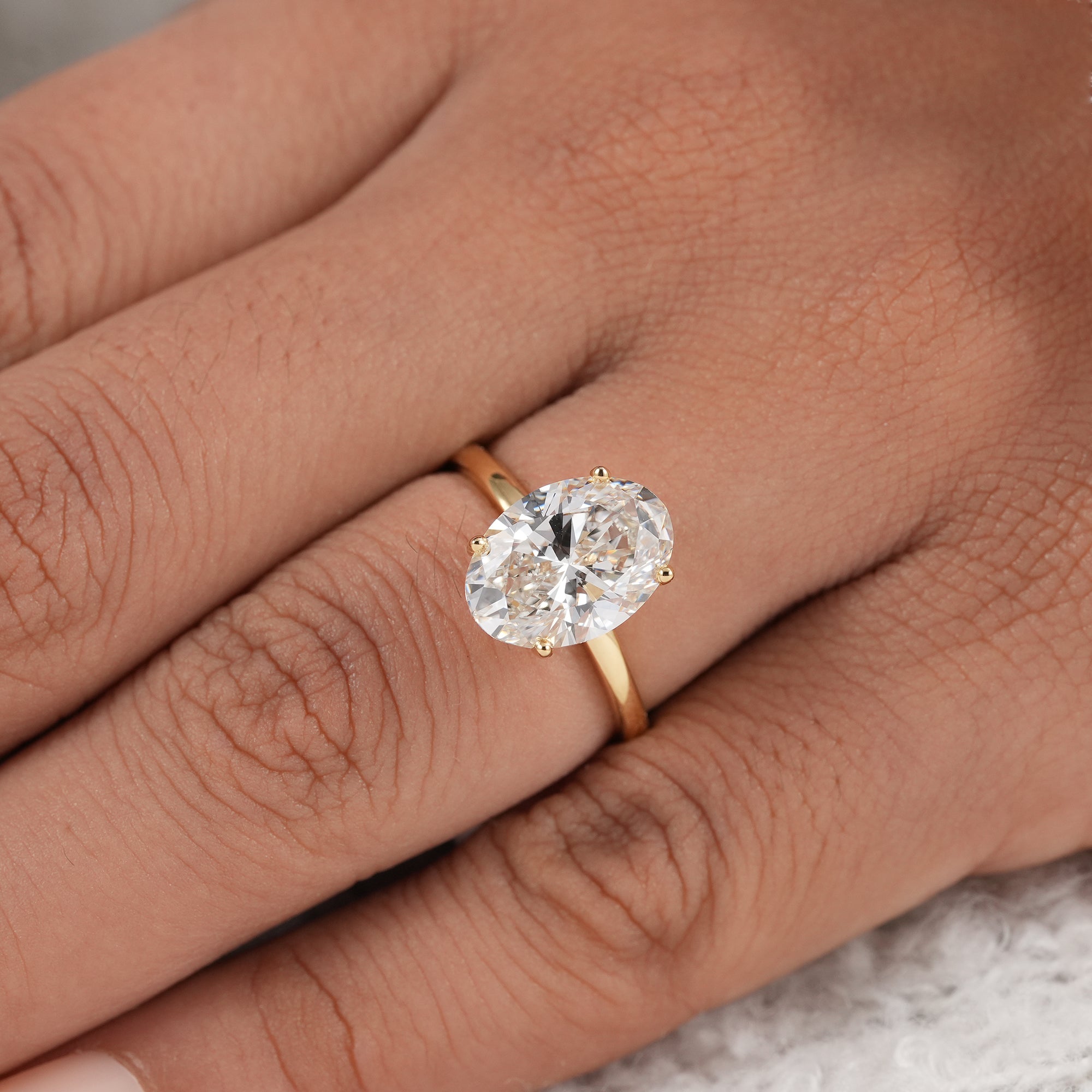 Elegant oval lab diamond solitaire ring for bridal jewelry.