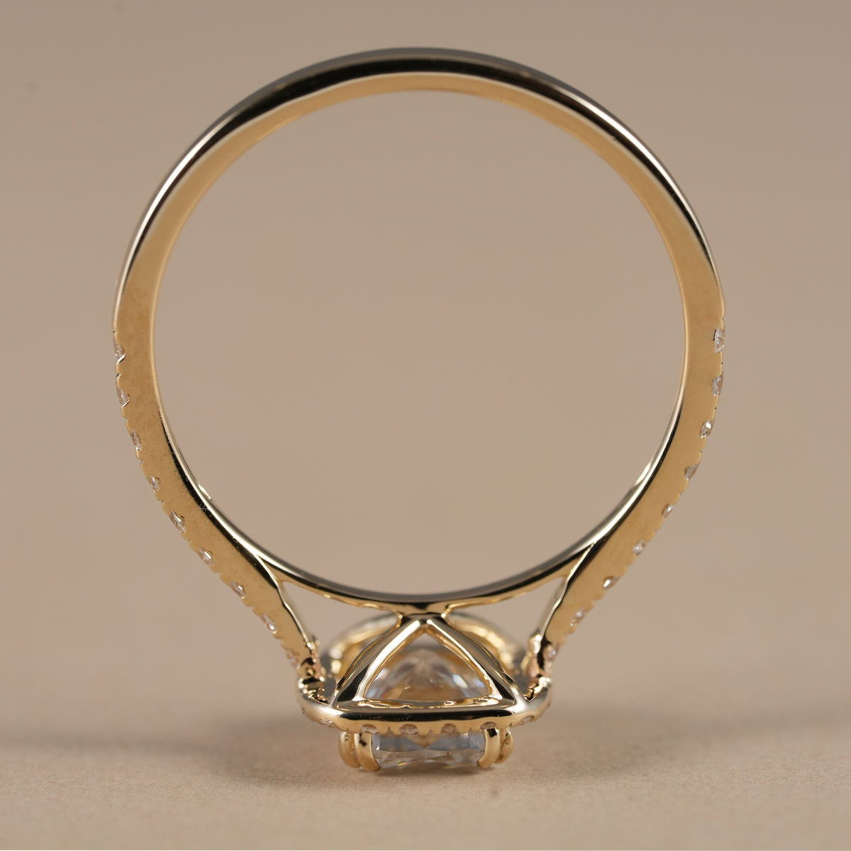 Luxury cushion halo engagement ring handcrafted with ethically grown lab diamonds in solid gold.