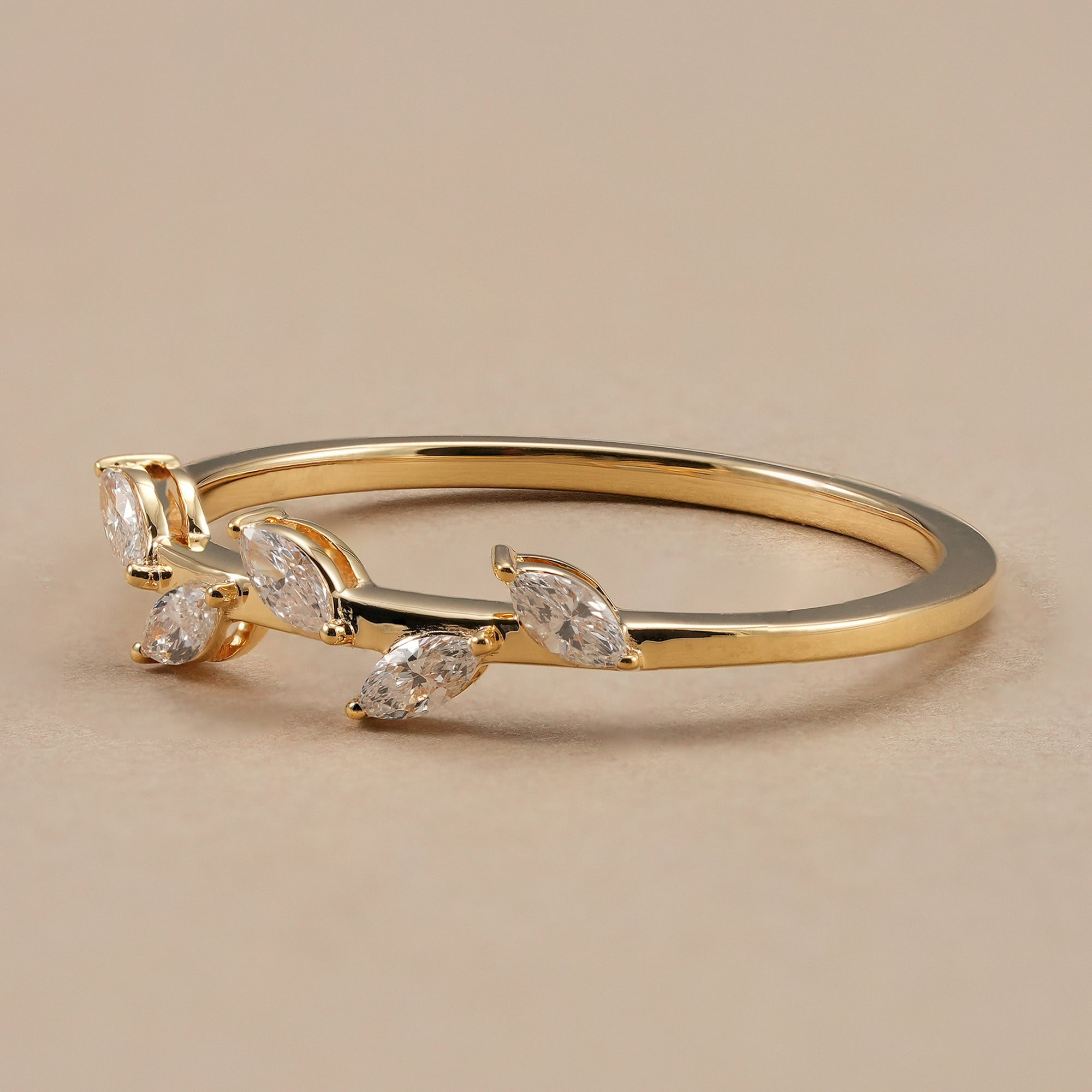 Elegant marquise leaf diamond ring crafted in yellow gold