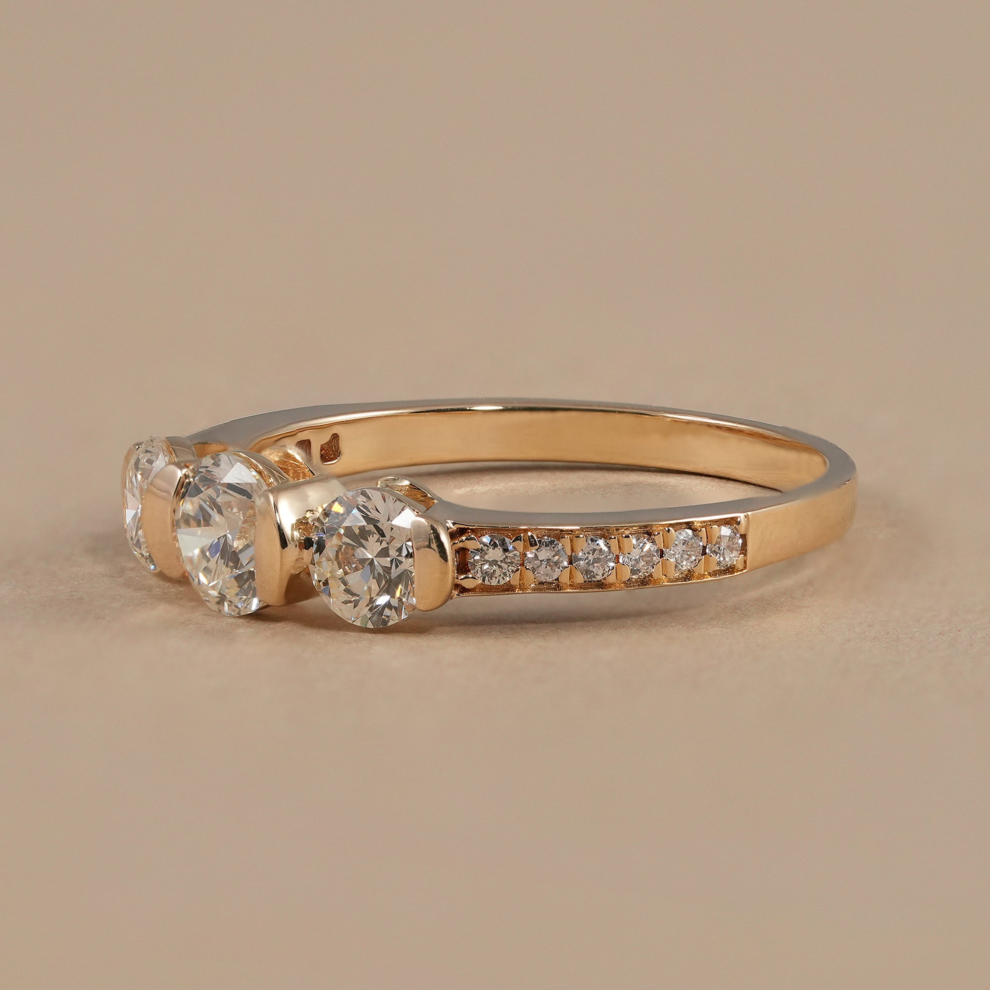 Elegant past present future diamond ring with pavé diamond band