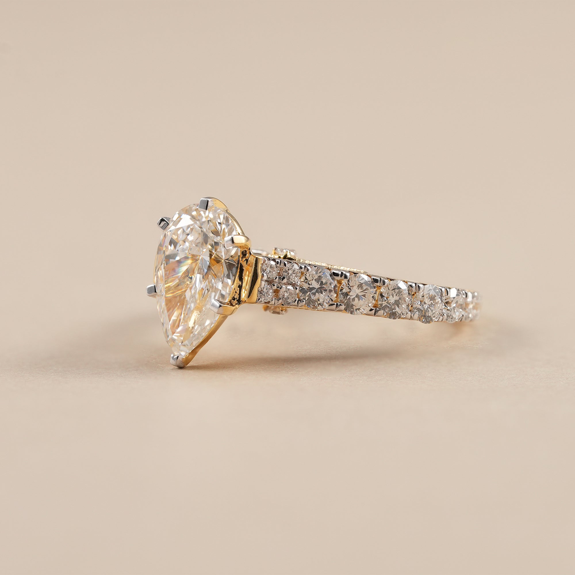 Vintage filigree pear lab grown diamond engagement ring in yellow gold
