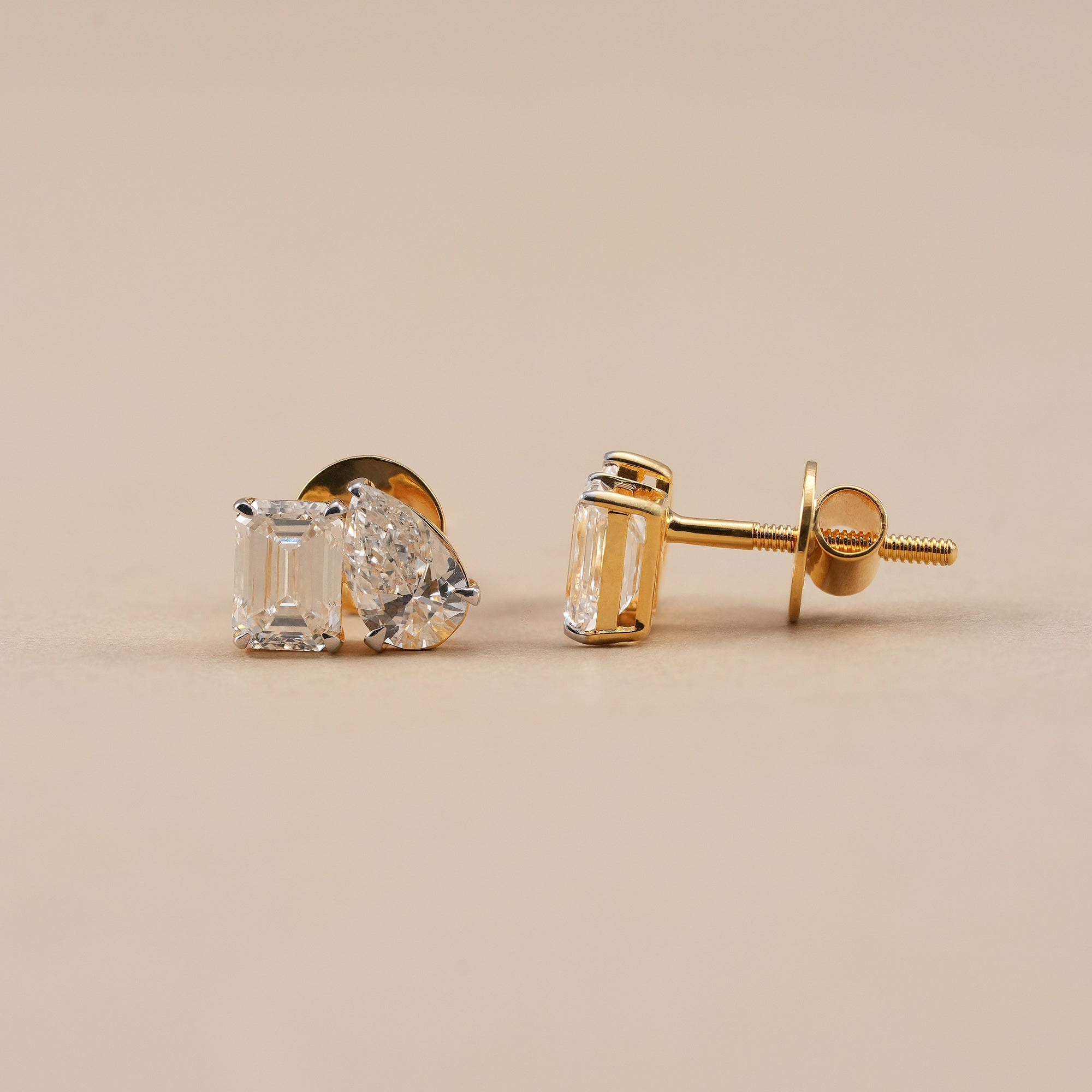 Luxury two stone diamond stud earrings with secure screw back closure