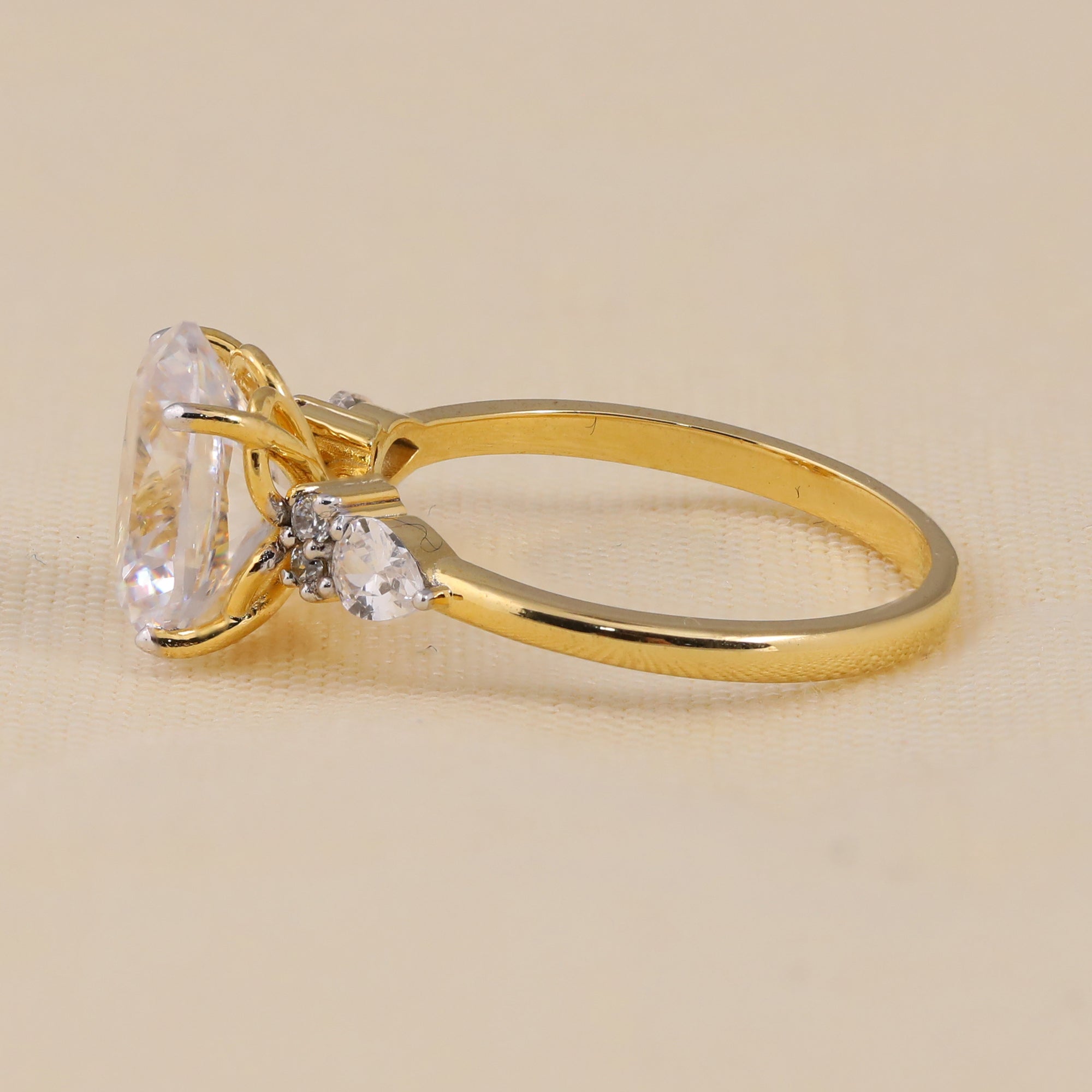 Oval cut lab created diamond ring with pear side stones