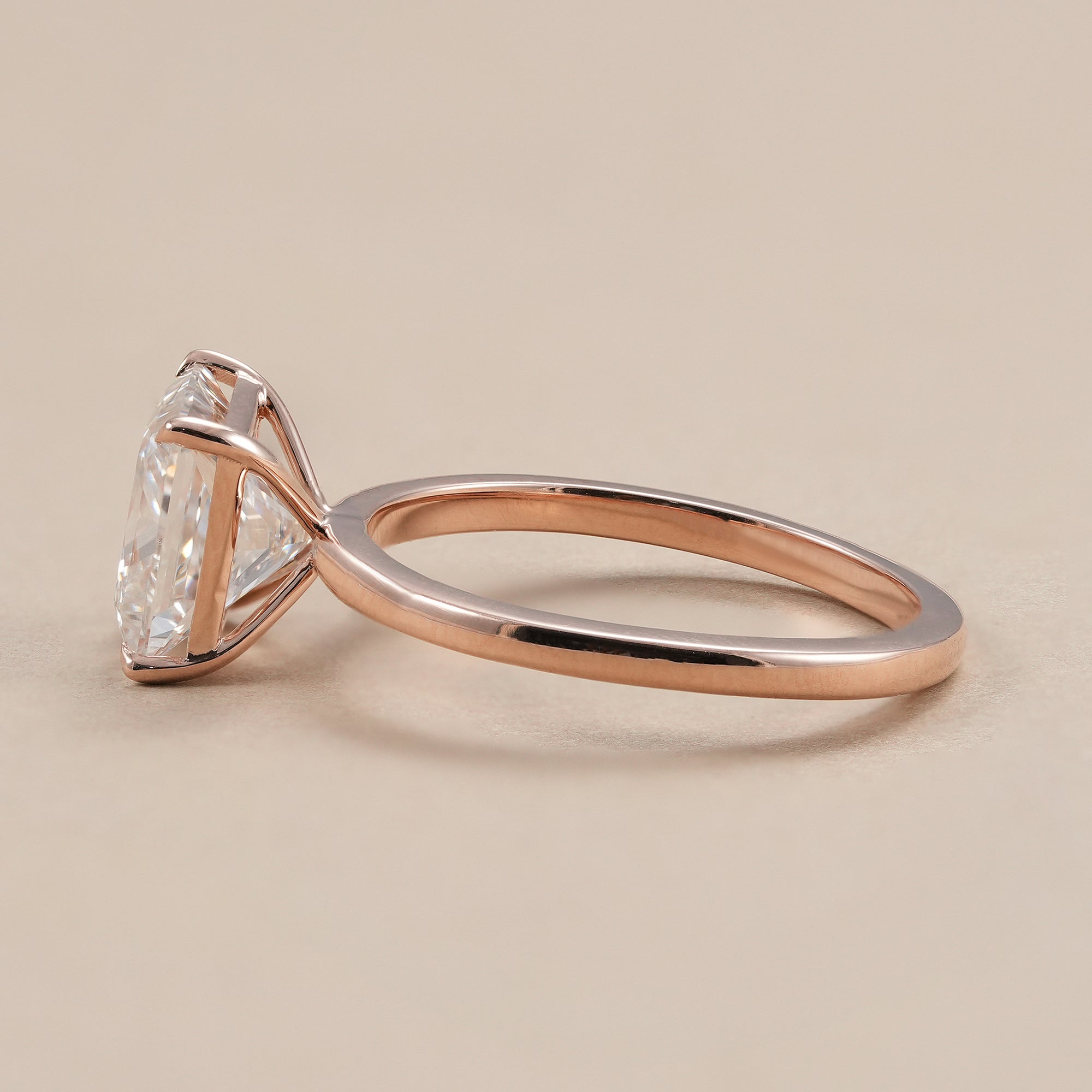 Rose gold princess cut solitaire diamond ring for women.