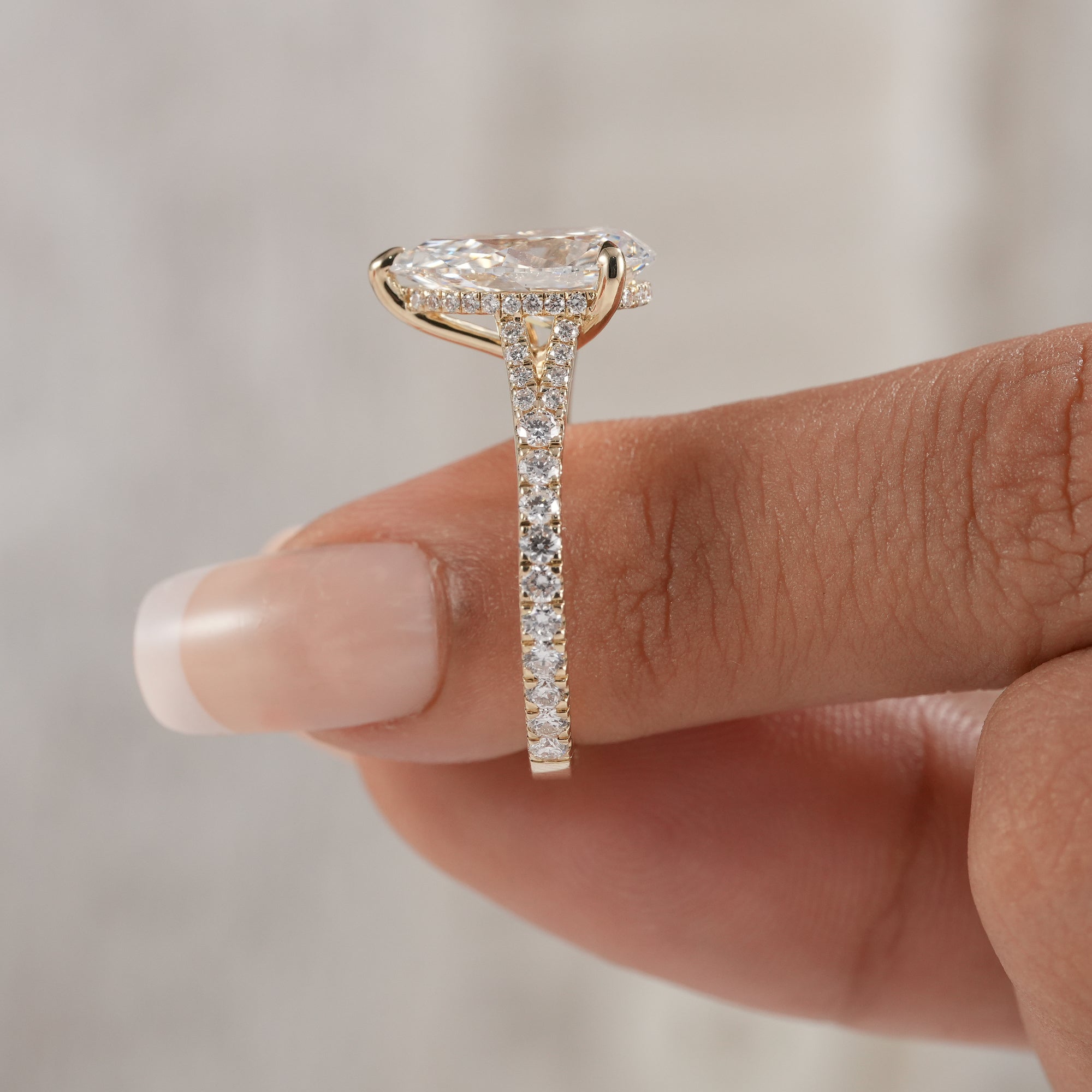 Side profile of pear lab diamond split shank engagement ring