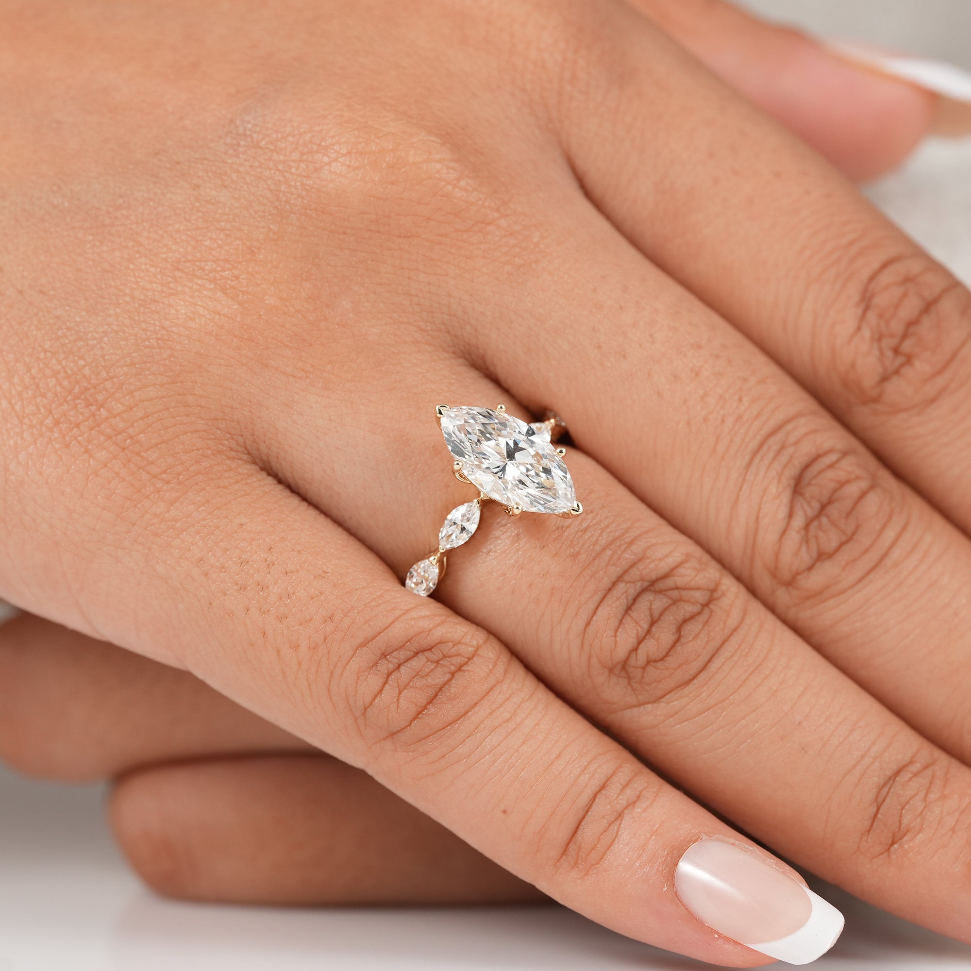 Marquise Cut Diamond Engagement Ring With Marquise Accents Band