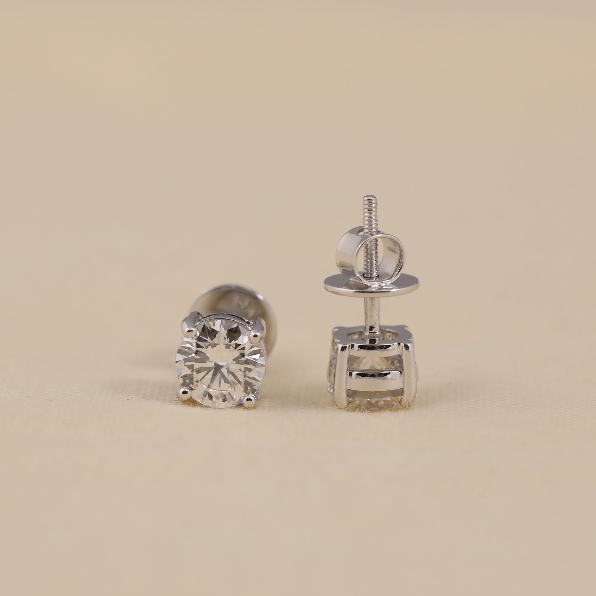 Timeless round diamond stud earrings suited for weddings and parties