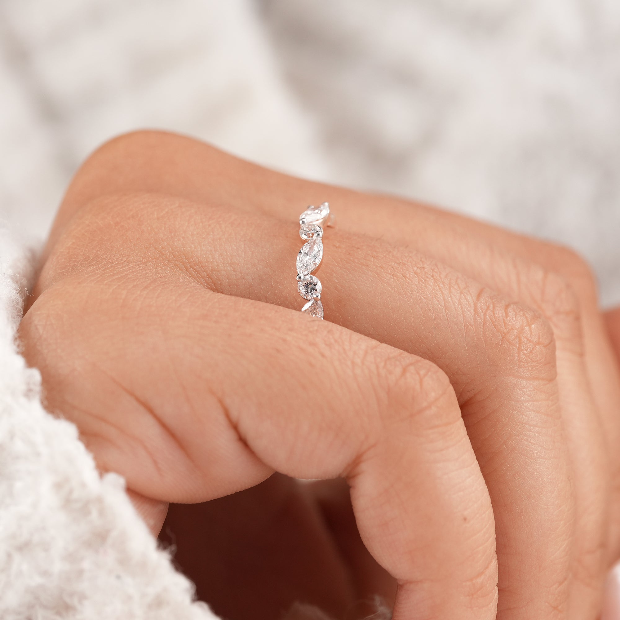Luxury bridal jewelry featuring marquise and round diamonds.