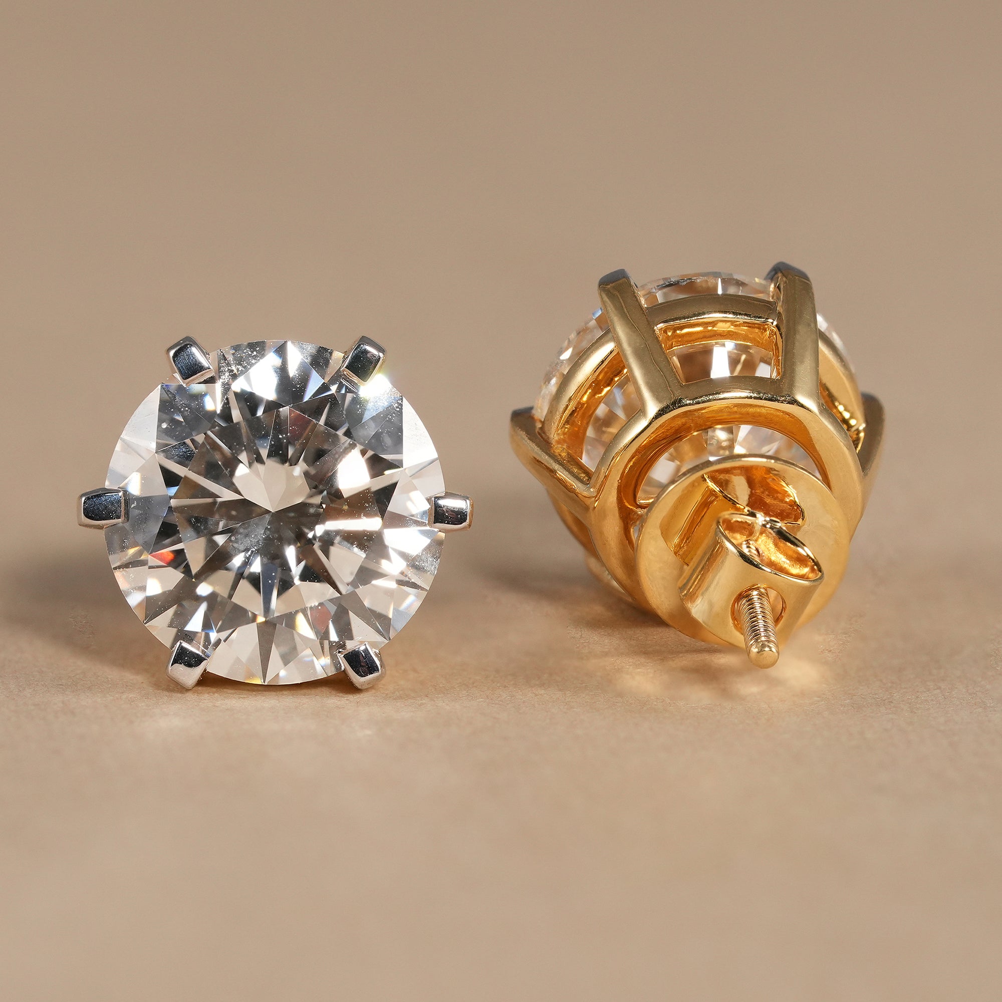 Timeless round lab diamond stud earrings with secure six prong basket setting