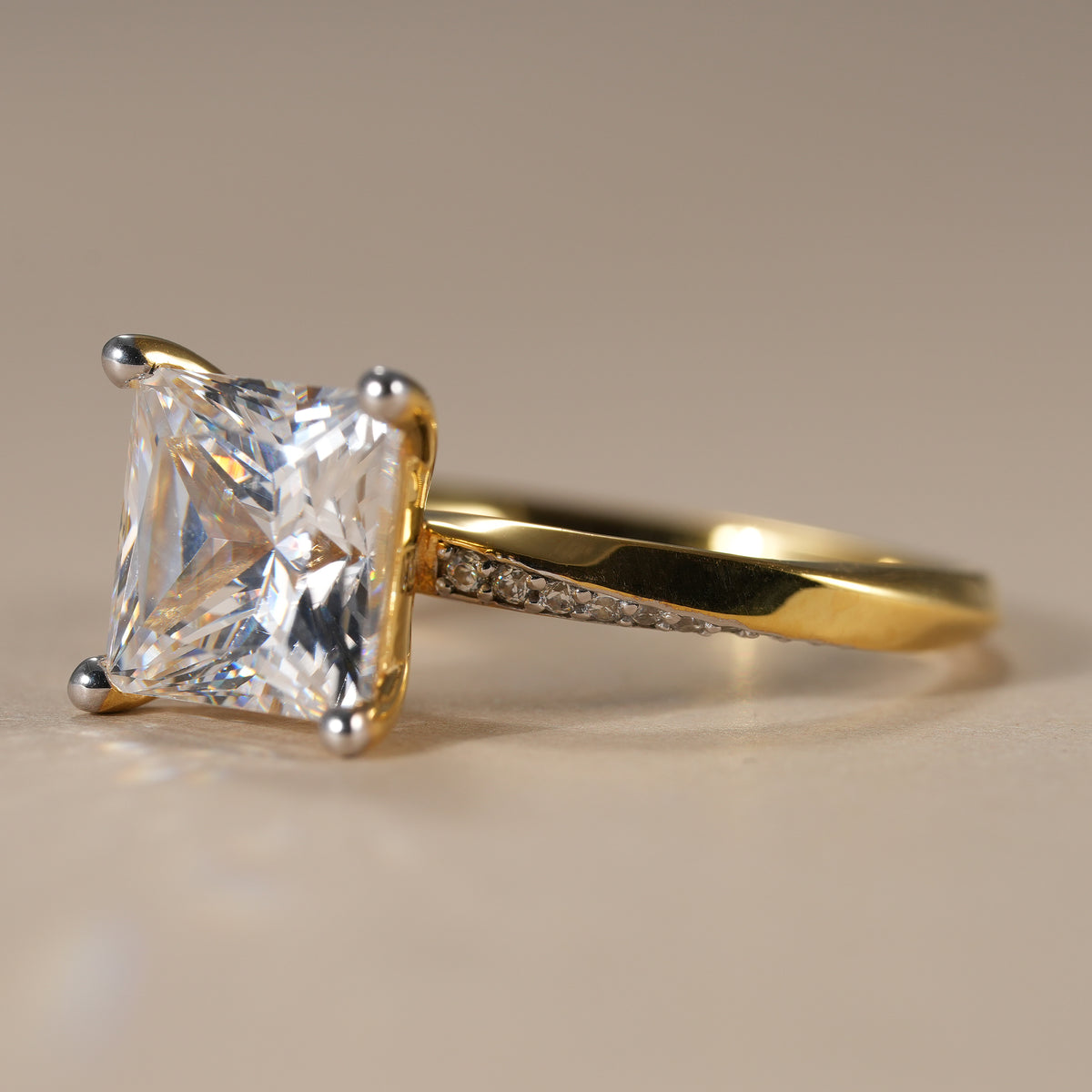 IGI certified princess cut lab diamond ring handcrafted in solid gold with elegant twisted shoulders.