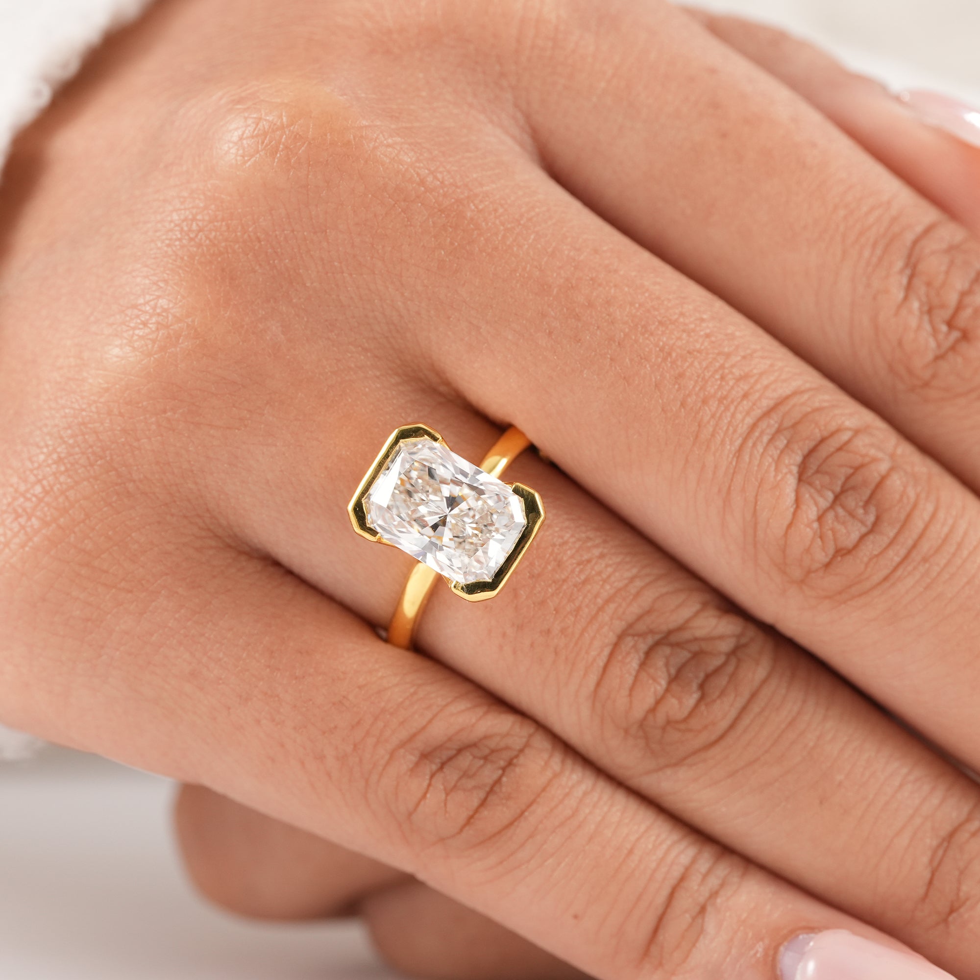 Timeless radiant engagement ring featuring an IGI certified diamond.