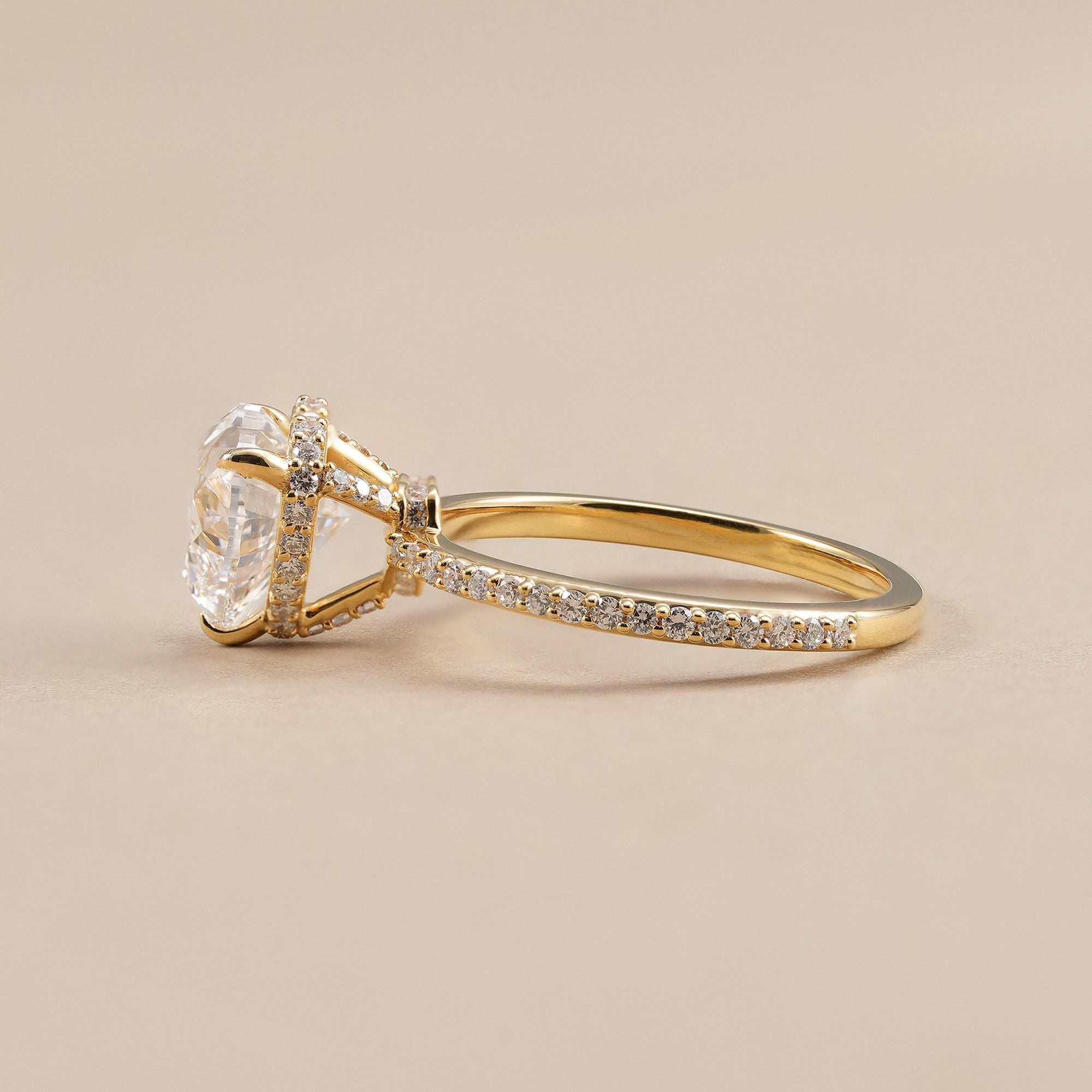 Elegant heart diamond engagement ring with delicate pavé band