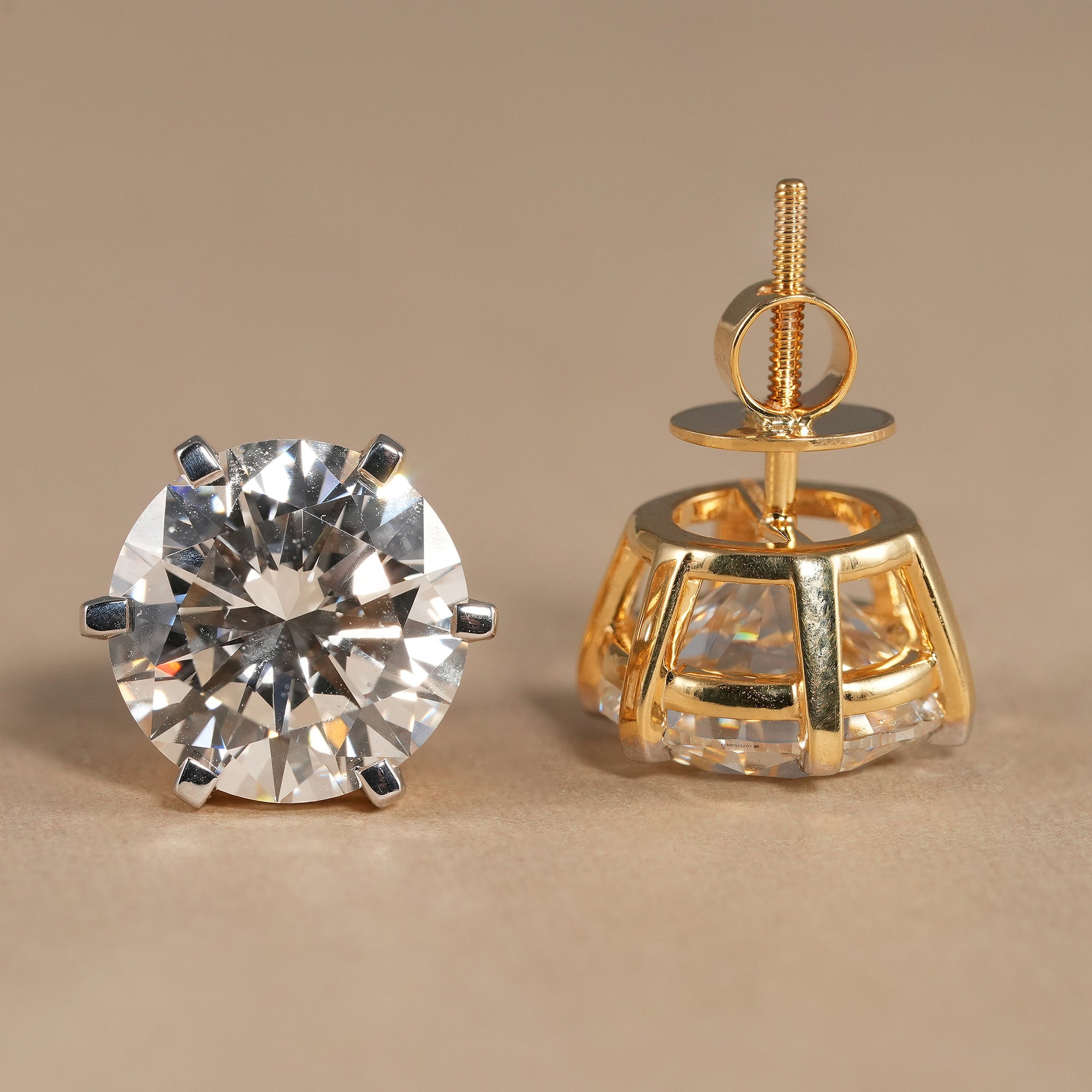 Minimalist round diamond solitaire earrings crafted with brilliant lab grown diamonds