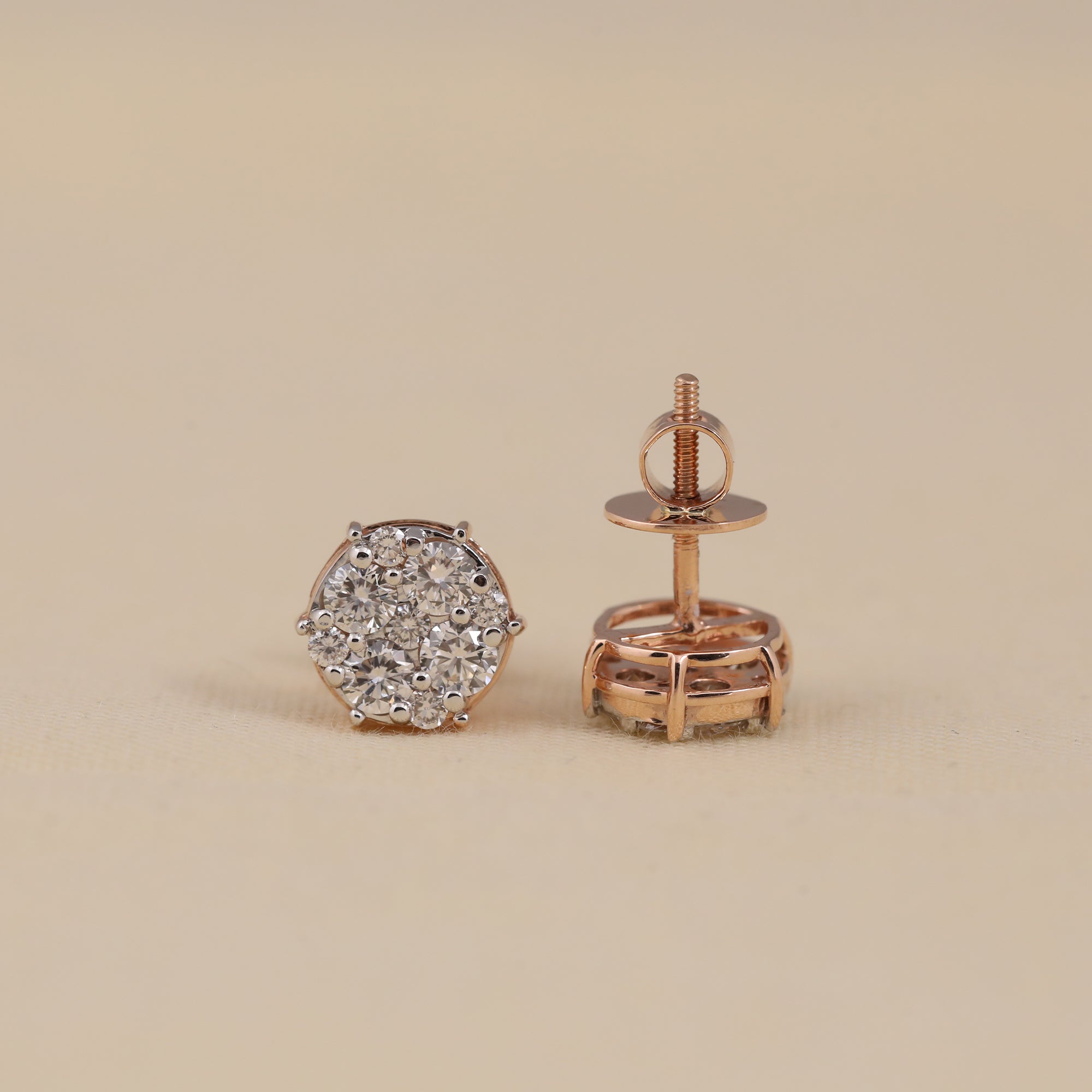 Sparkling round cluster diamond stud earrings suited for everyday wear.