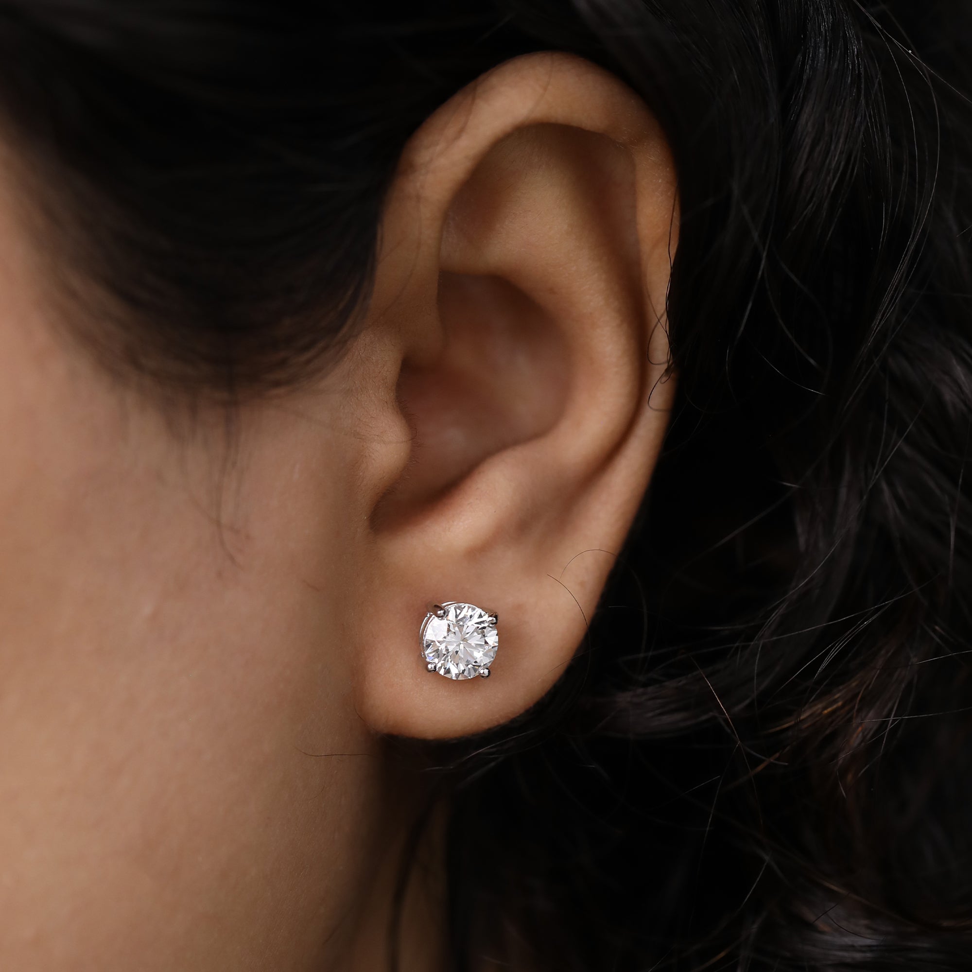 Sparkling round diamond earrings perfect for festive occasions and celebrations