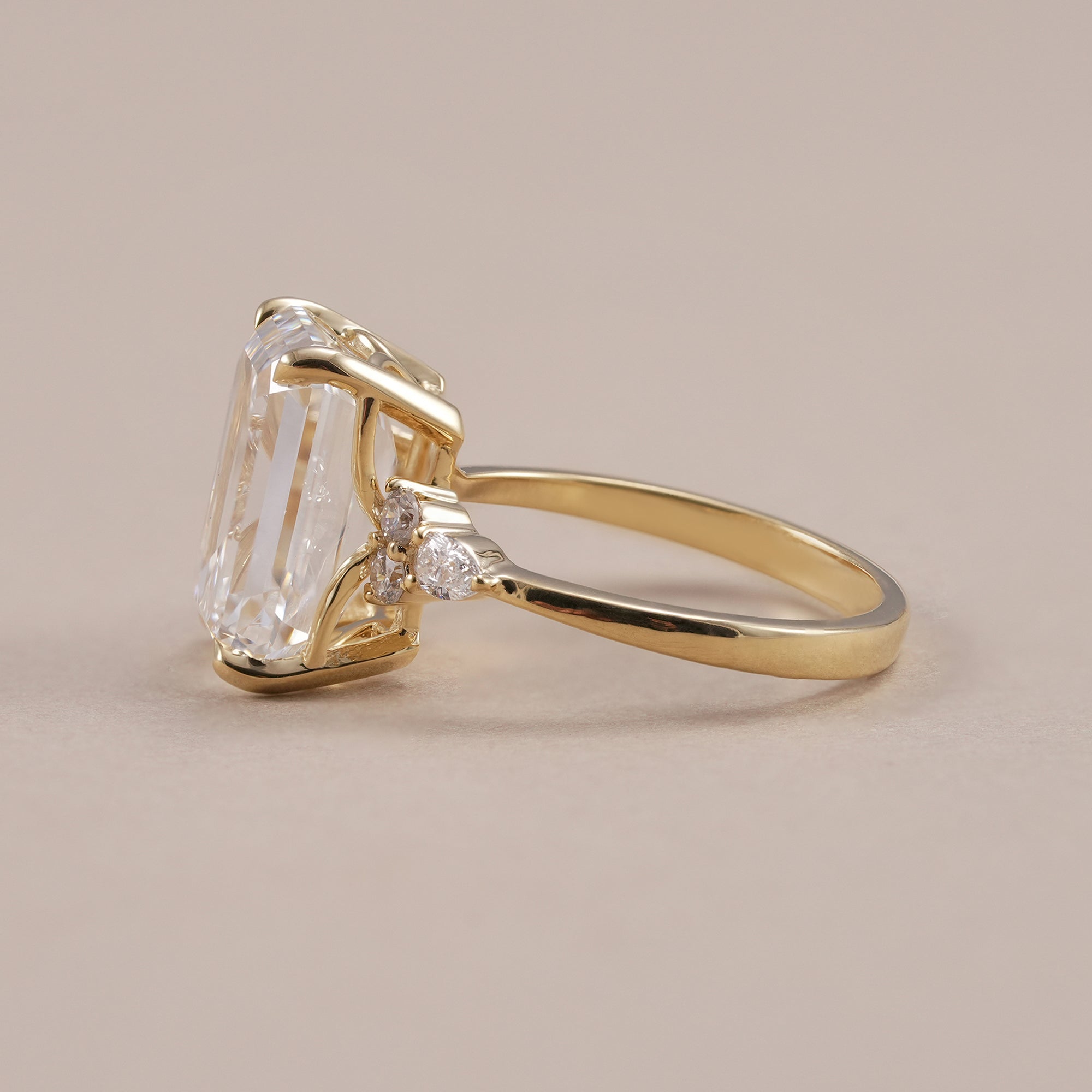 Luxury emerald cut lab grown diamond ring in yellow gold