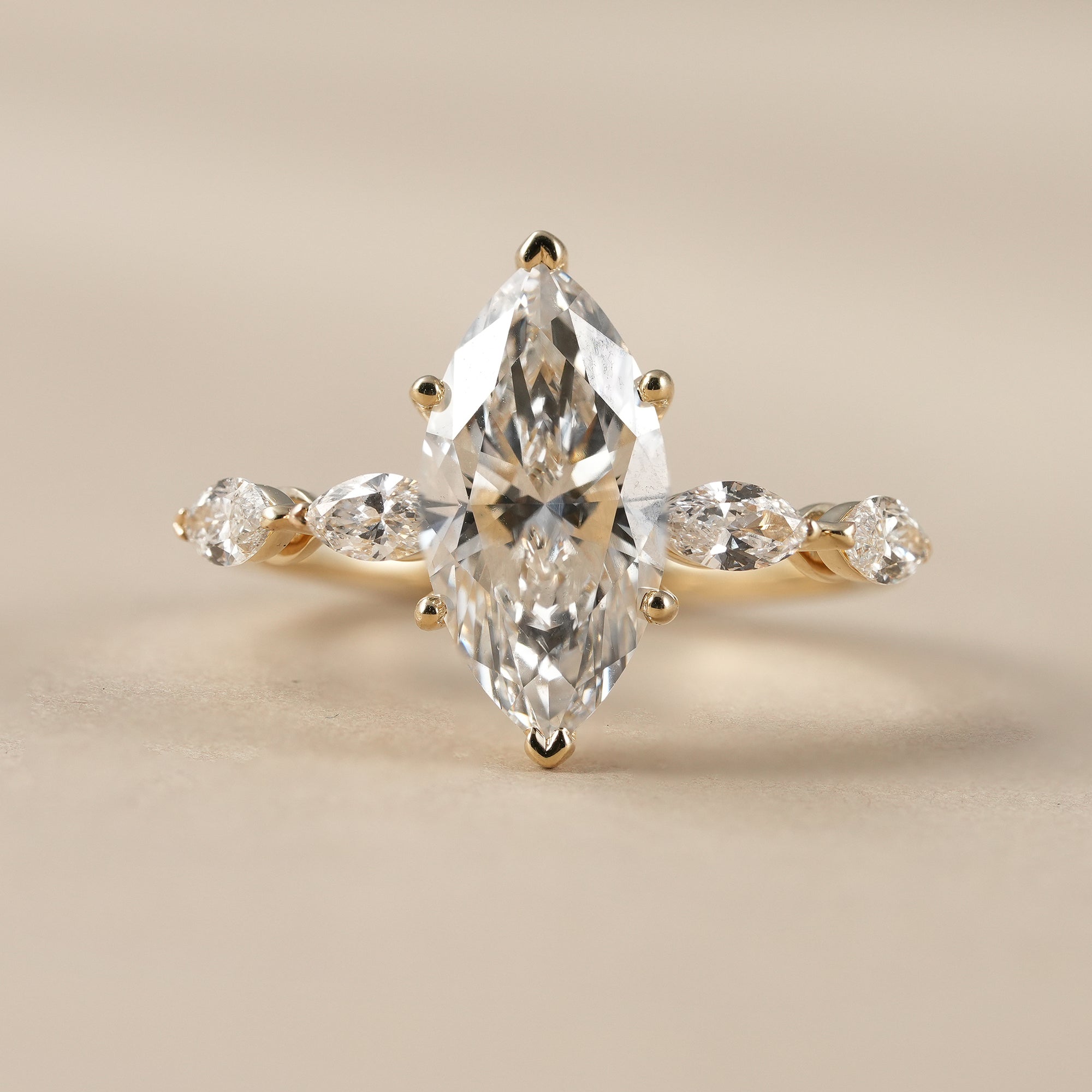 Marquise Cut Diamond Engagement Ring With Marquise Accents Band