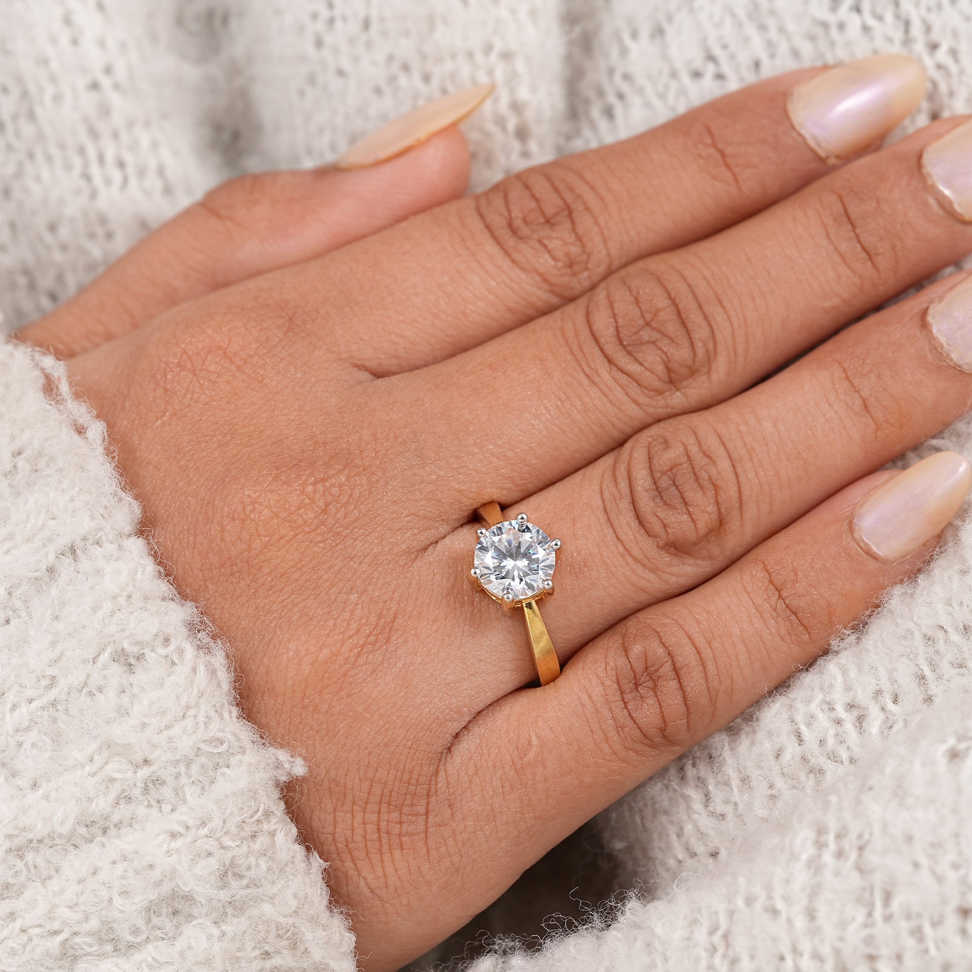Modern minimalist engagement ring with round lab diamond and polished gold band