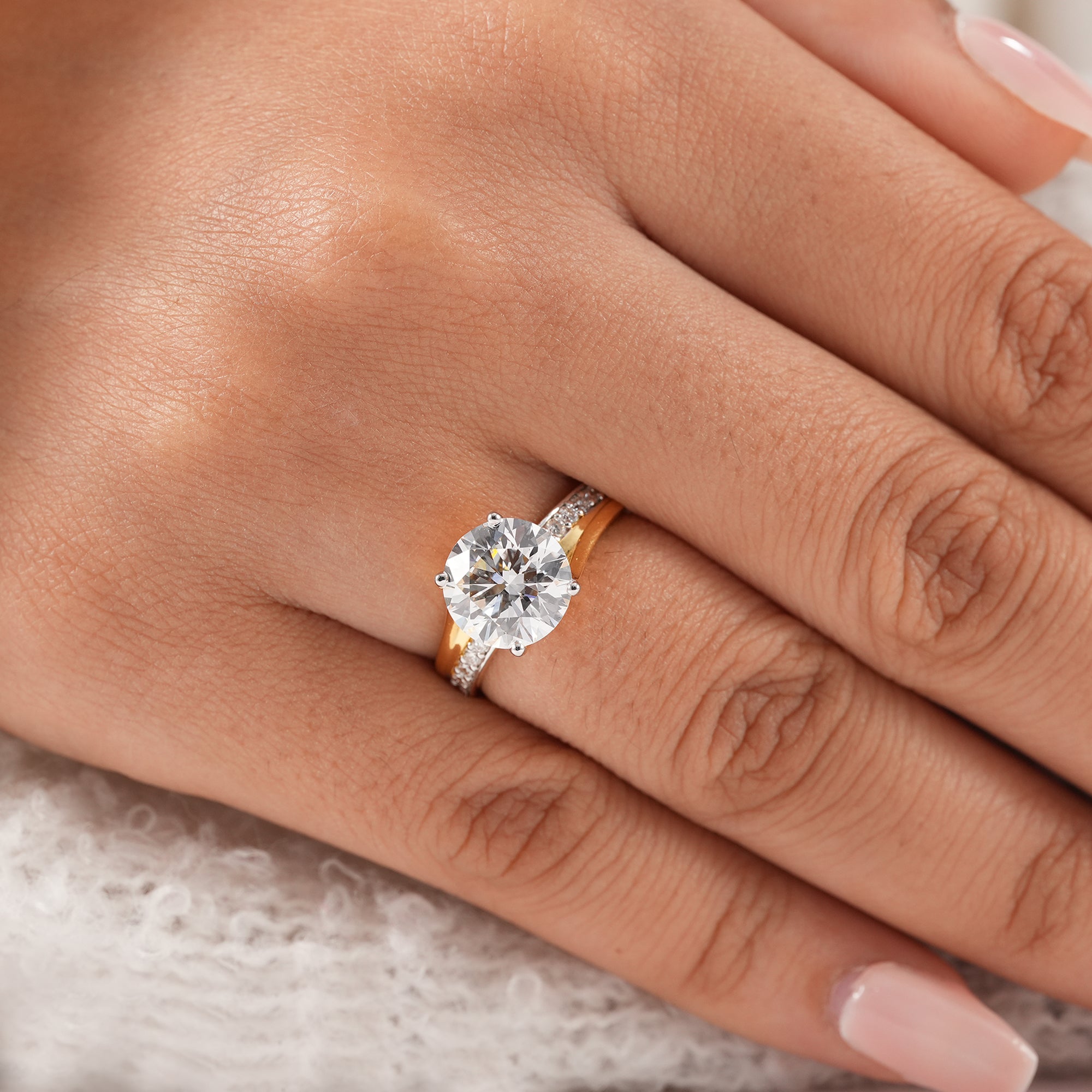 Luxury round diamond engagement ring with split shank setting