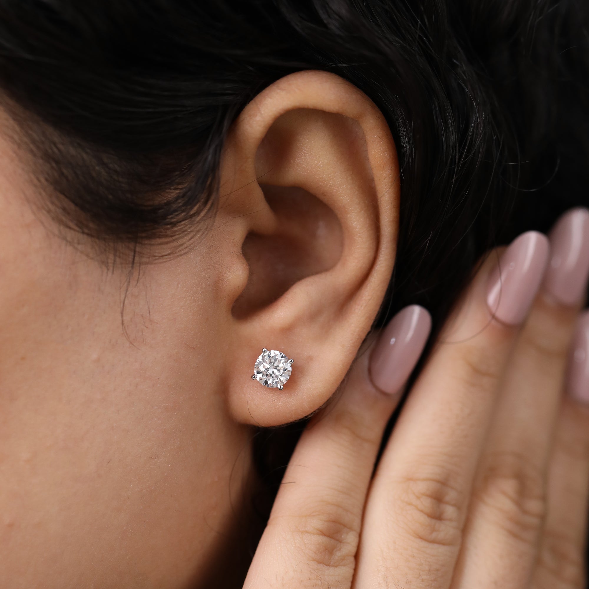Luxurious round diamond stud earrings crafted for engagement gifting and special celebrations