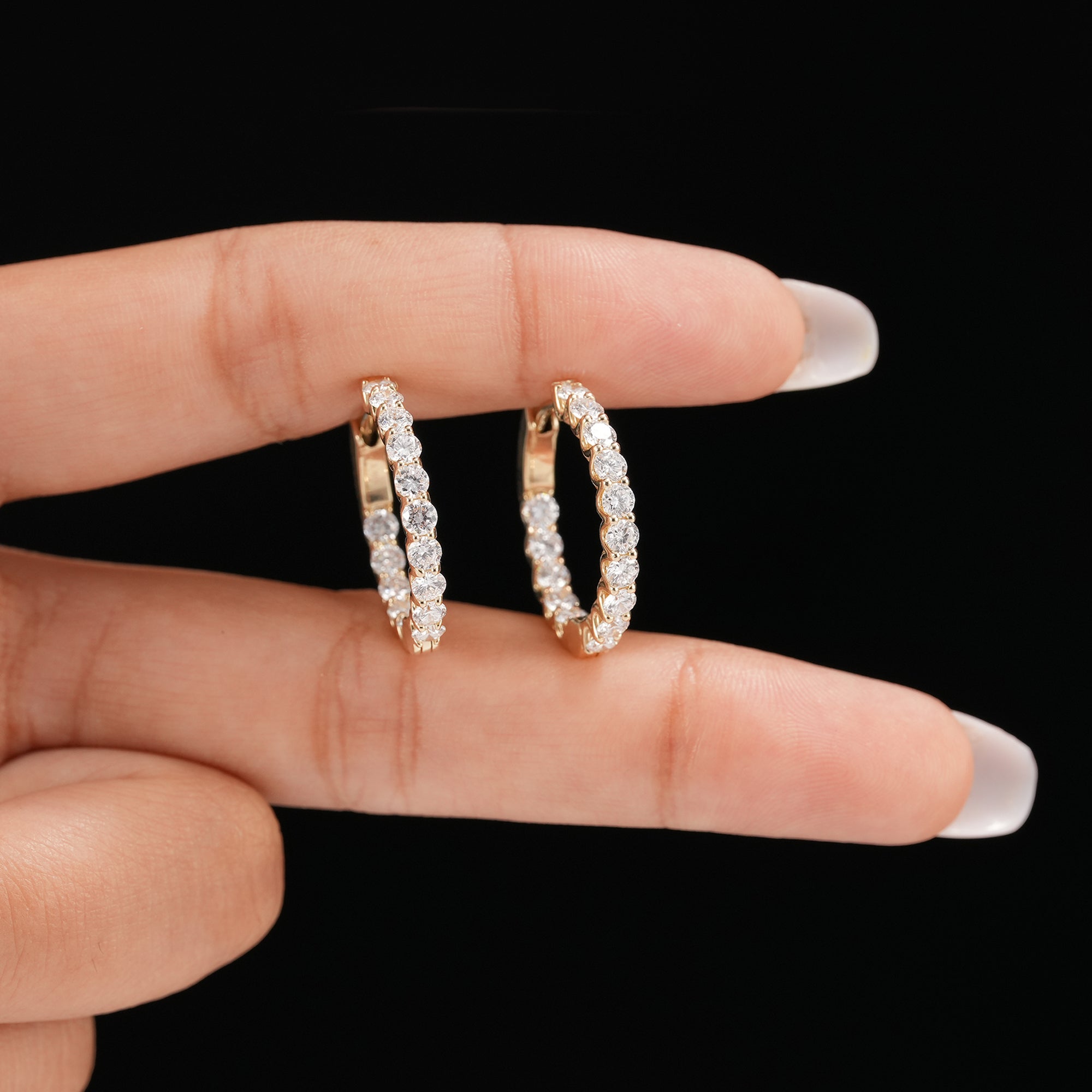 Bridal diamond huggie earrings featuring sparkling round lab grown diamonds