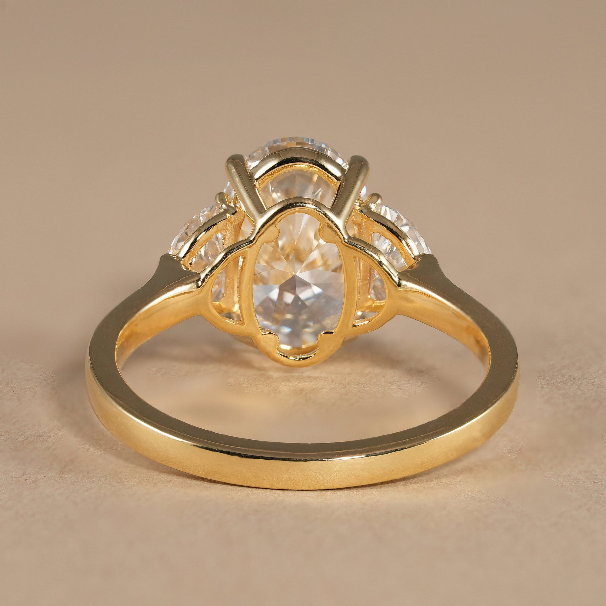 Timeless oval lab diamond engagement ring with classic three stone setting