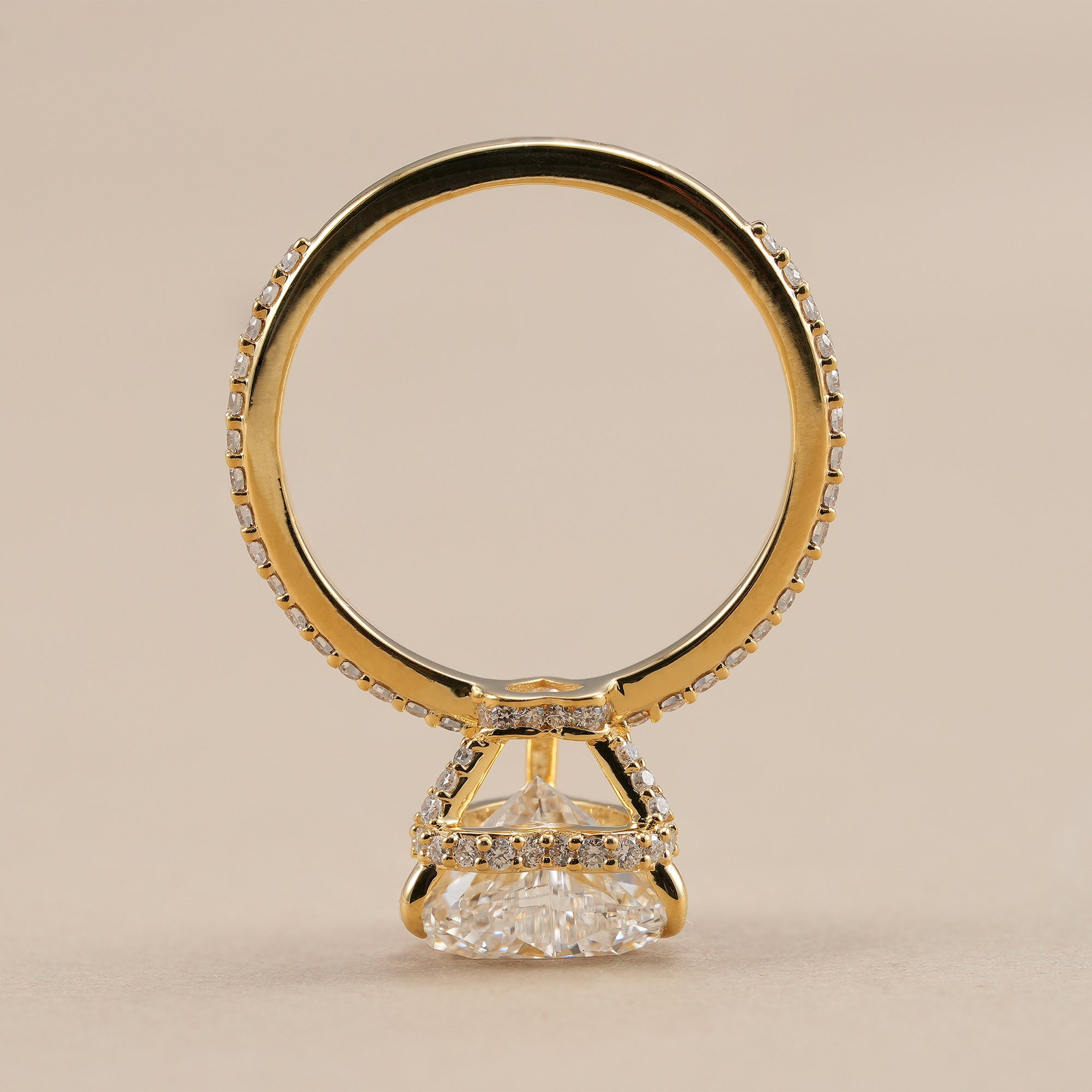 Romantic heart shaped diamond ring with hidden halo setting