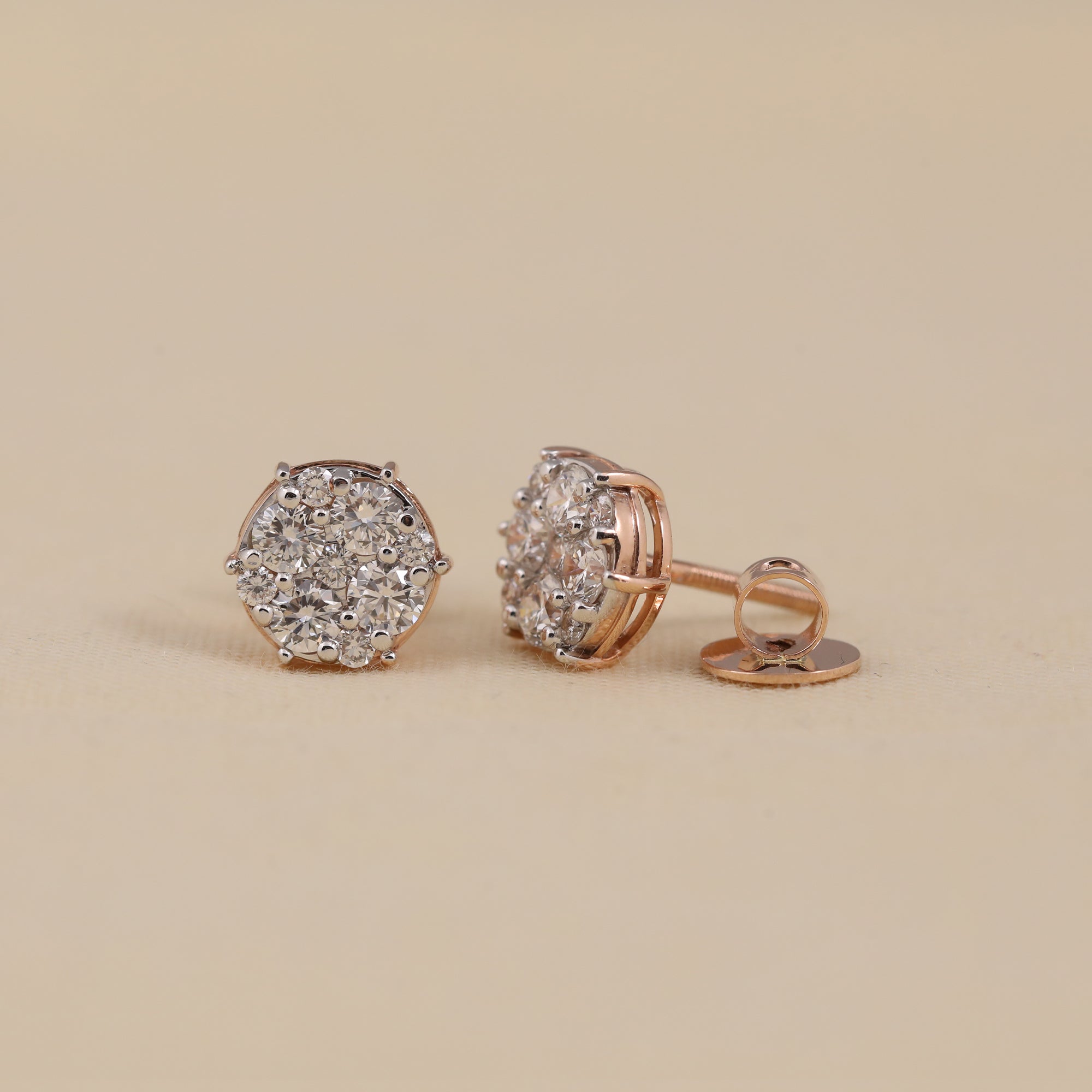 Round cluster diamond earrings offering timeless sparkle for birthday celebrations.