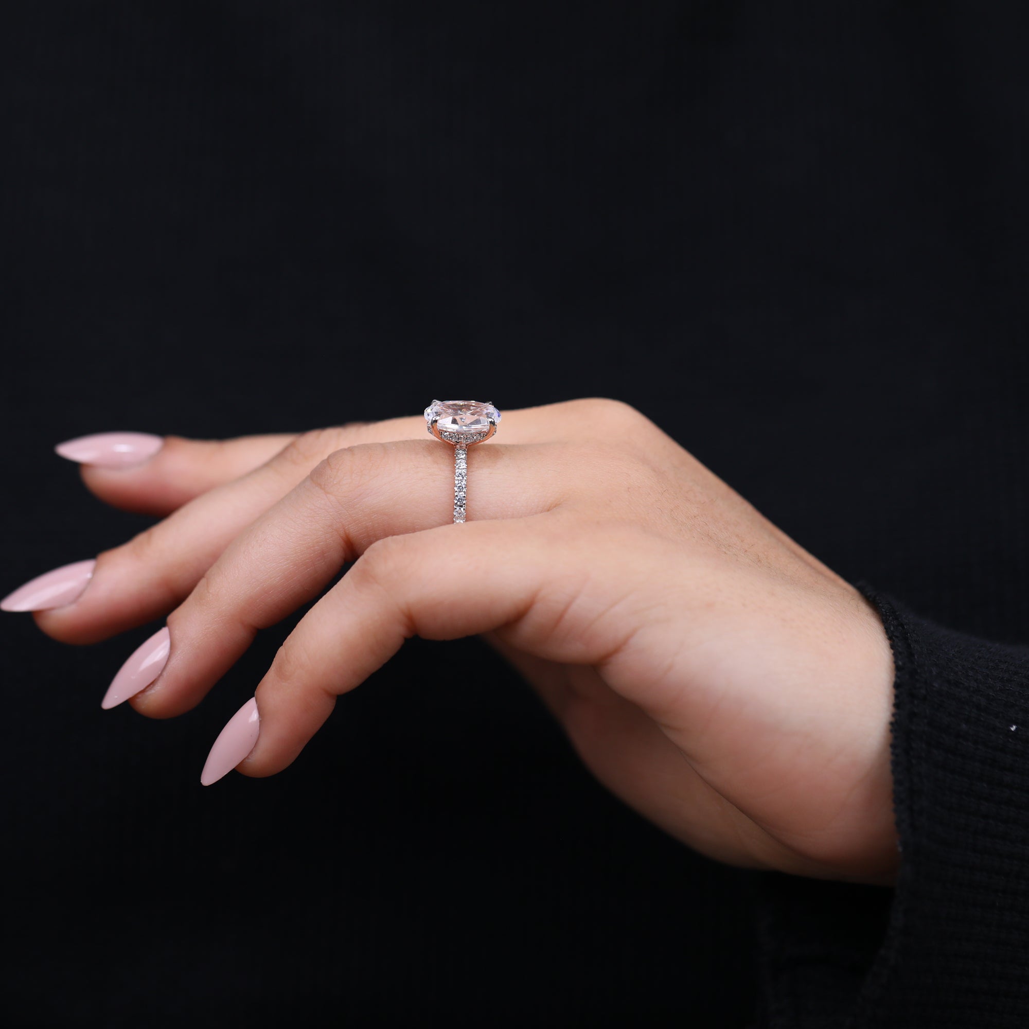 Oval solitaire lab grown diamond ring with diamond accented band