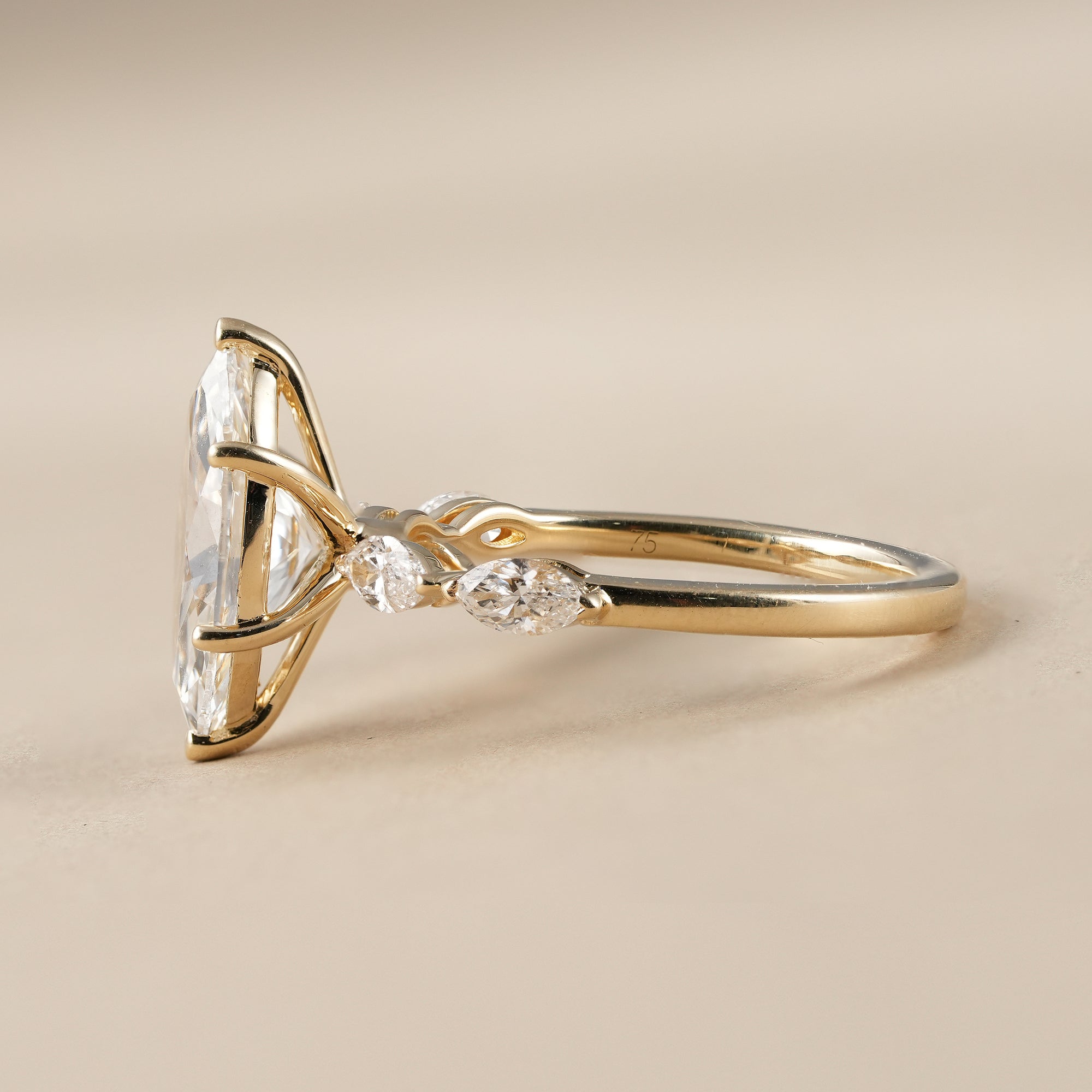 Marquise Cut Diamond Engagement Ring With Marquise Accents Band