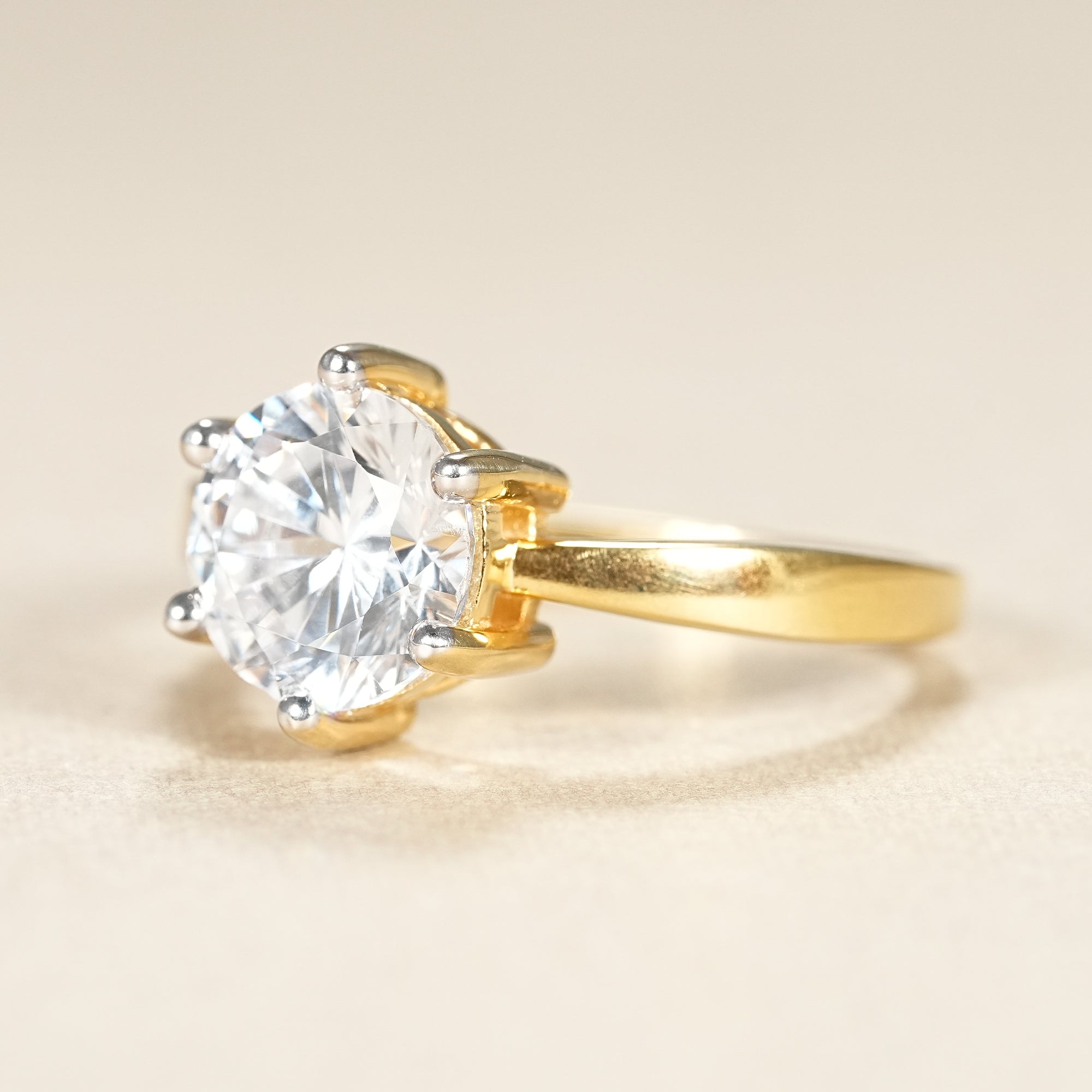 Minimalist round cut lab grown diamond ring in elegant yellow gold setting