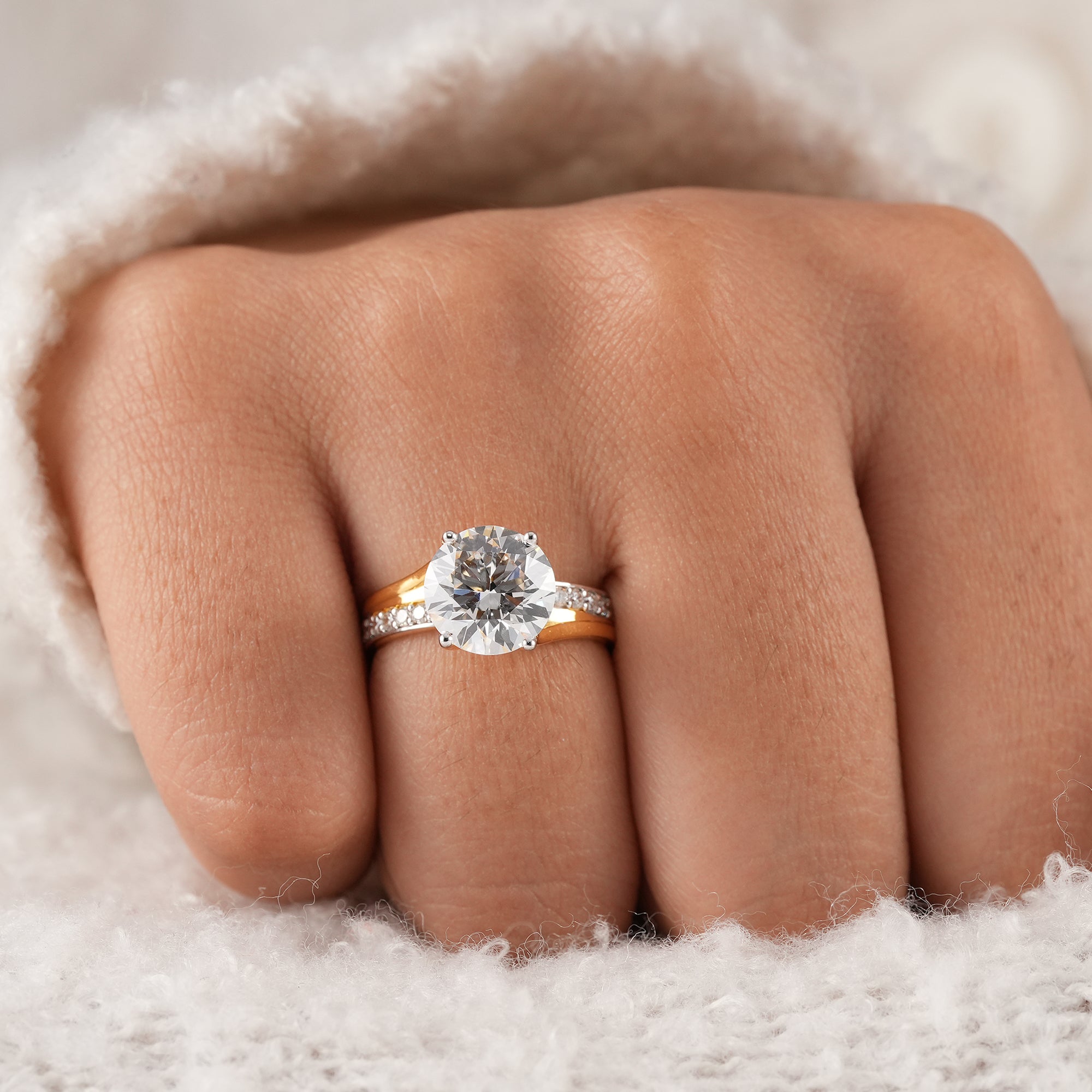 Round solitaire diamond ring with pavé band for bridal jewelry