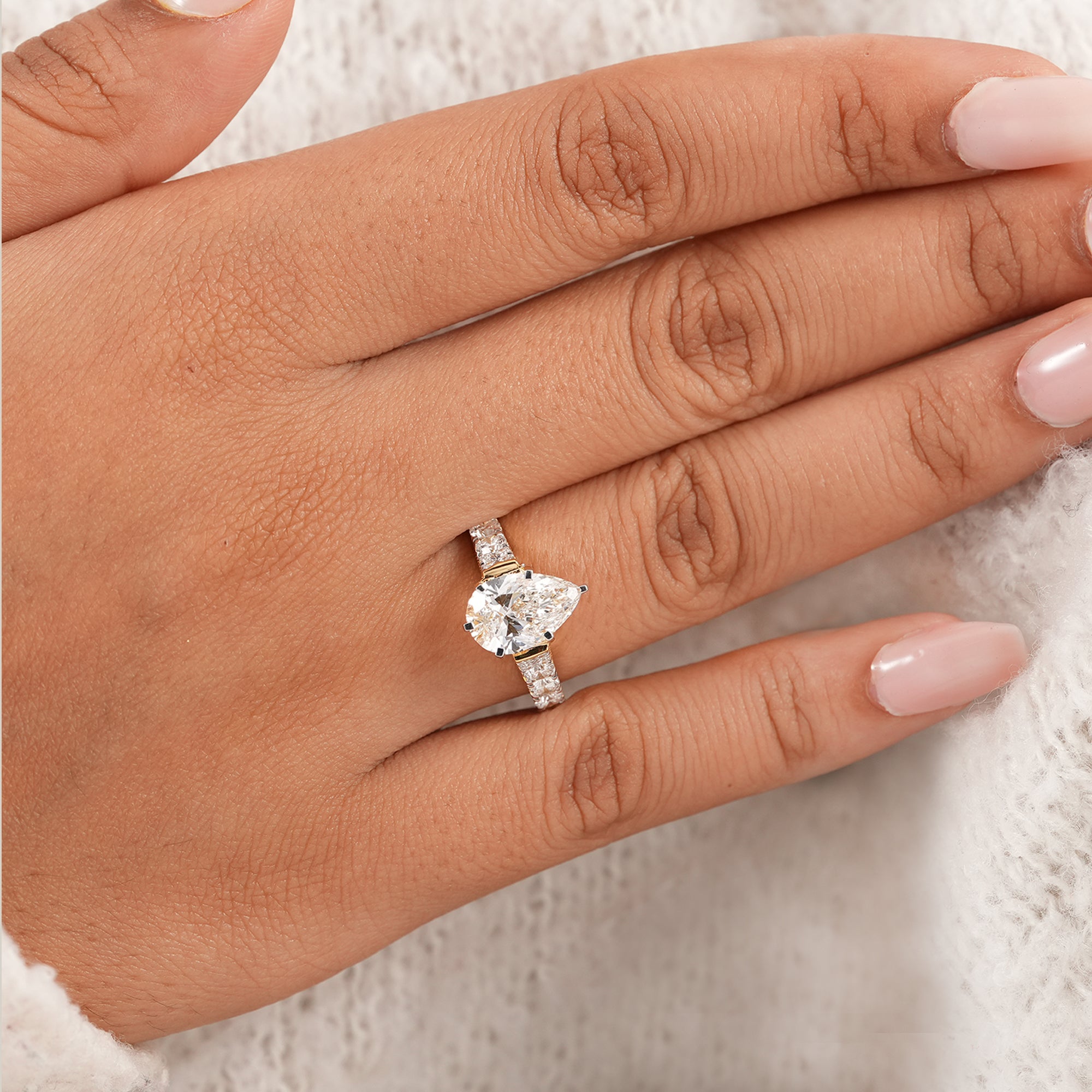 Pear solitaire ring with vintage filigree engraved band