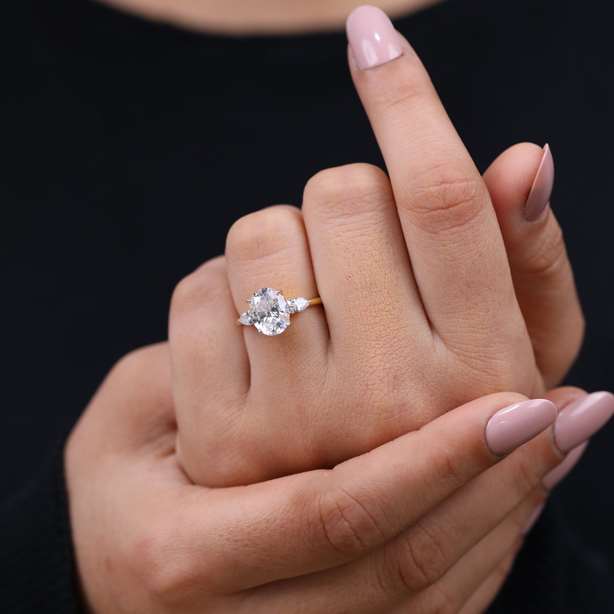 Classic three stone engagement ring featuring lab grown diamonds