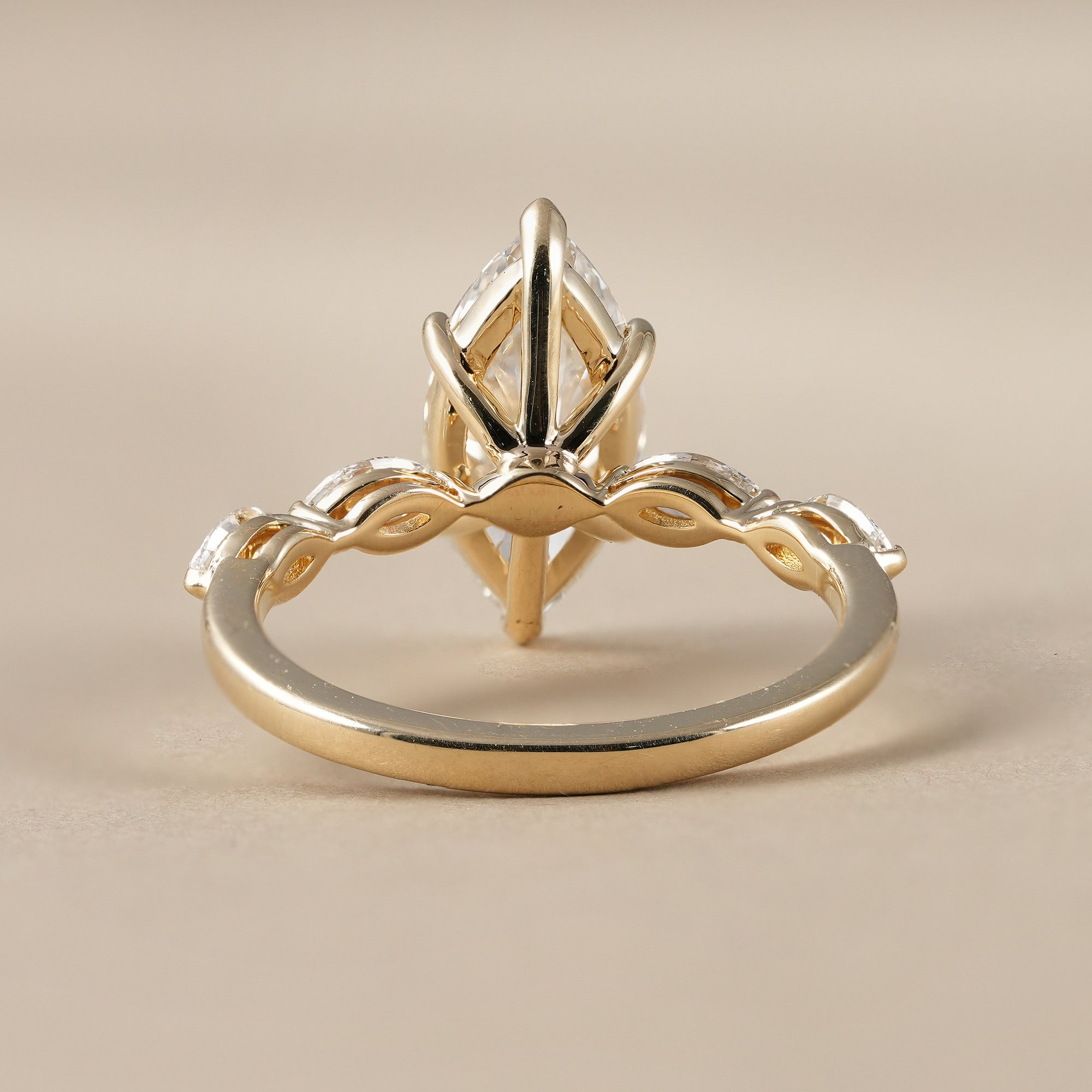 Marquise Cut Diamond Engagement Ring With Marquise Accents Band