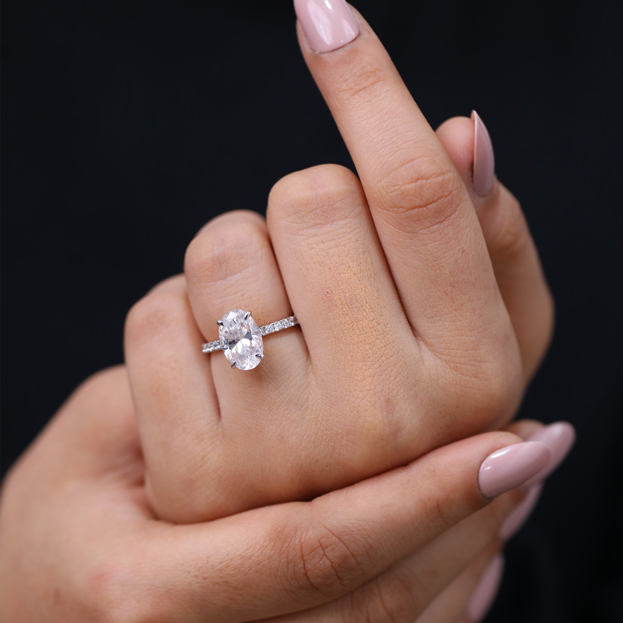 Classic oval engagement ring featuring lab grown diamond