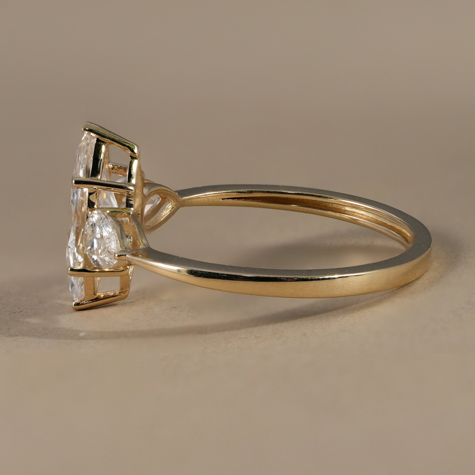 Three Stone Marquise Cut Lab Diamond Engagement Ring With Pear Side Stones